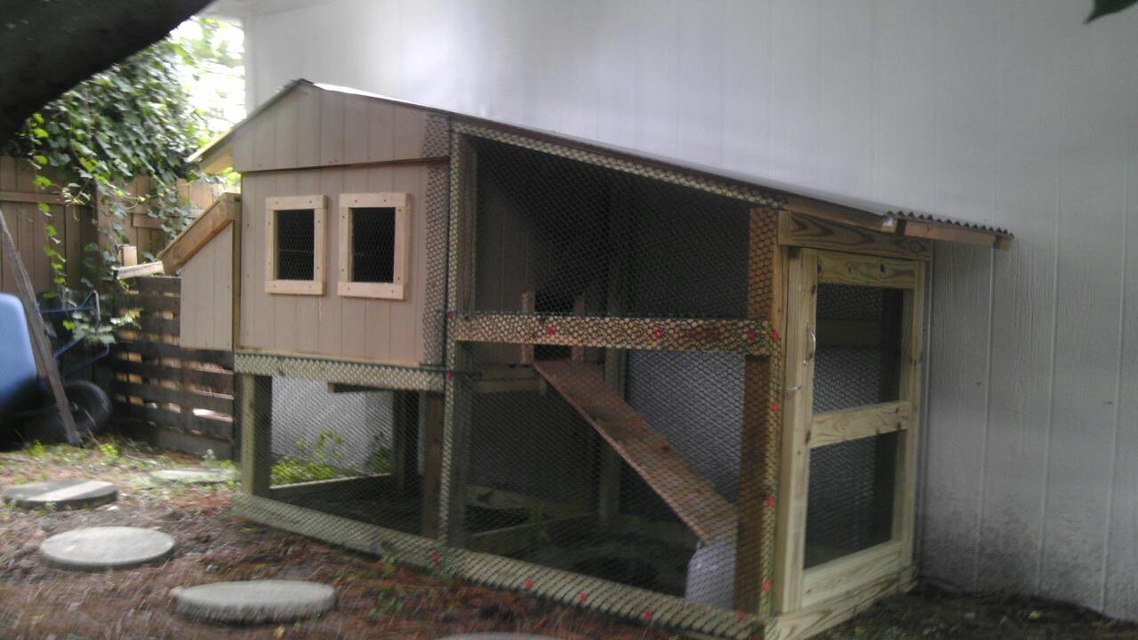 The home for our chickens constructed by my husband and 16 year-old son after the sticker shock of an $800 (WHAT?!!) coop for sale at a feed store.  It cost us only about $300 in material and is very heavy duty construction.