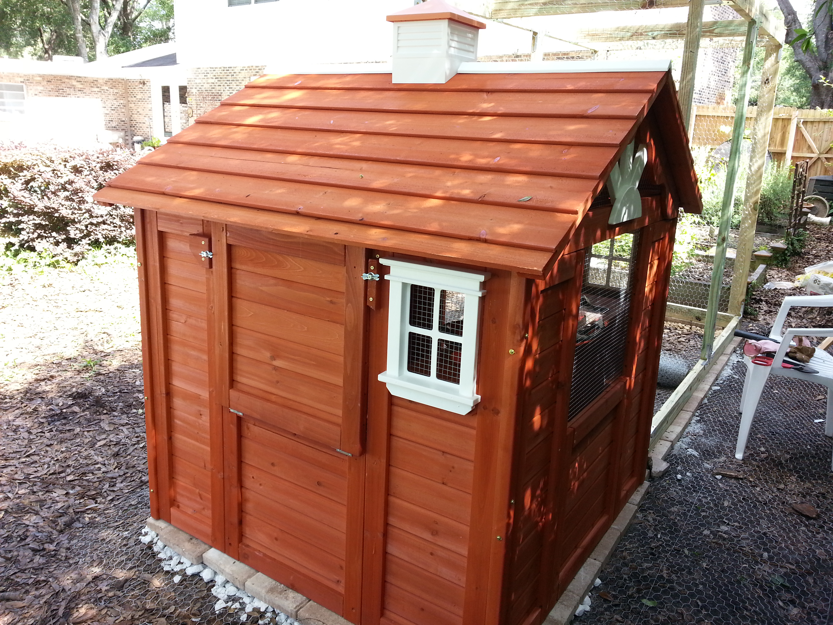 The little "trap door" next to the window provides easy access to the nesting boxes.
