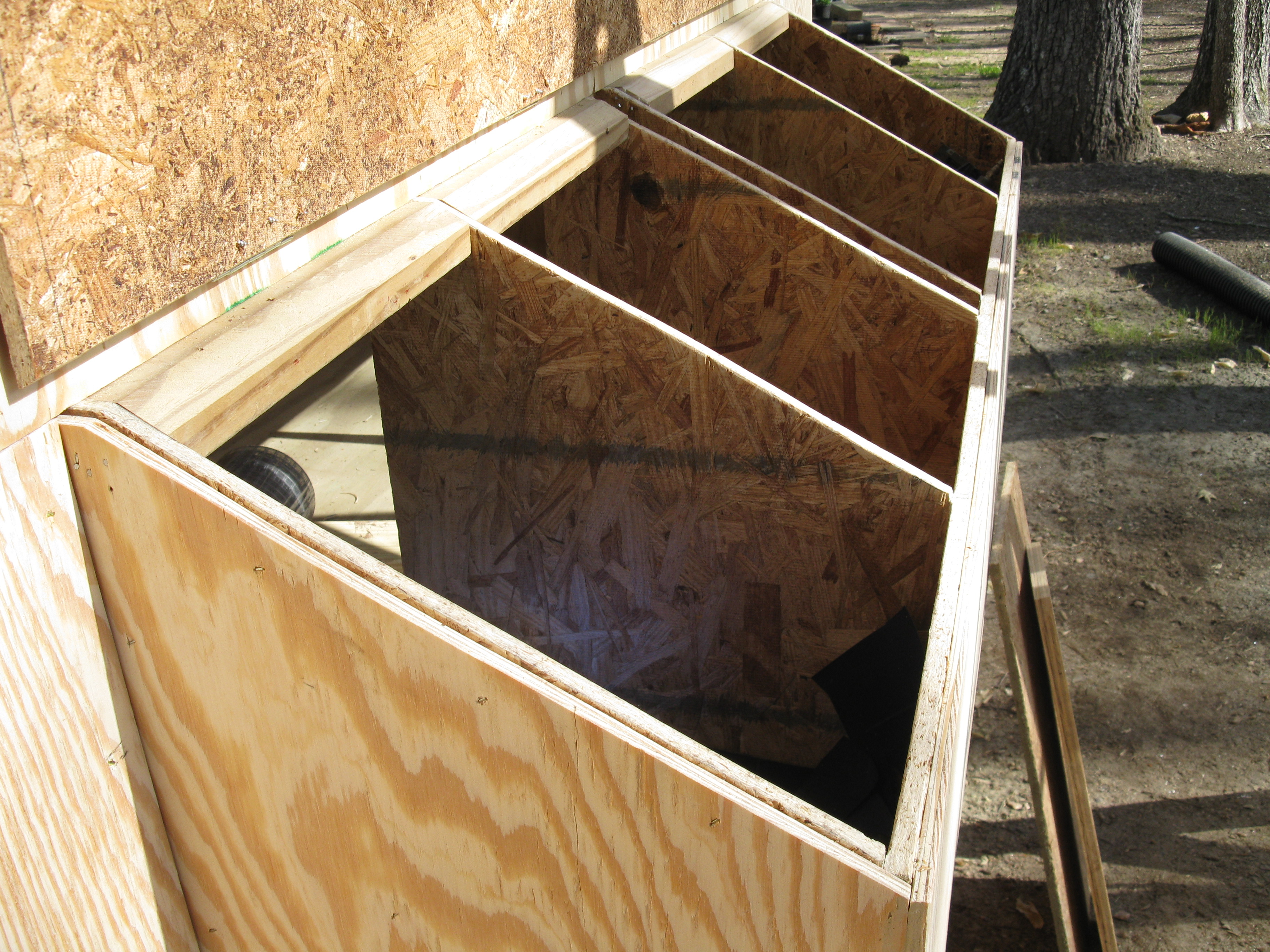 The nest boxes are oversized because I had the room.  The roof is hinged 7/16" OSB with an aluminum skin for weather proofing and reflecting the sun.