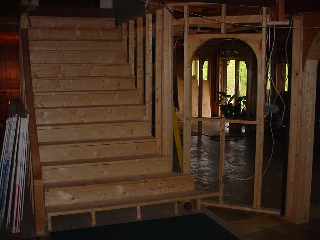 The new basement stairs framed and ready to drywall.