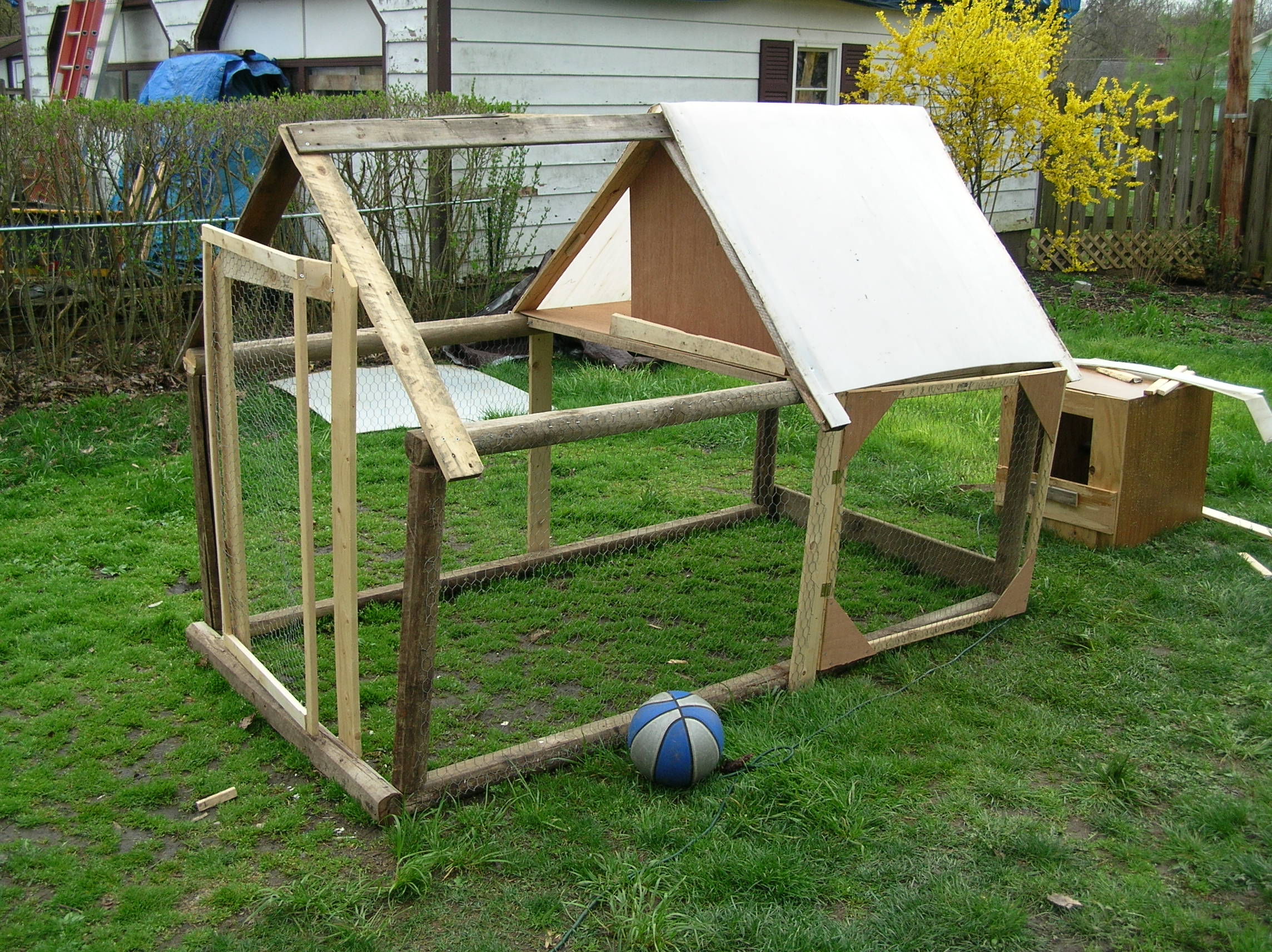 The new coop, just perfect for the big girls plus a few!  It was not quite finished here.