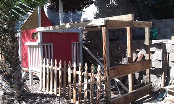The only major component not recycled was the picket fence.  Even the wire was salvaged "Tortoise Fence" from a construction project.