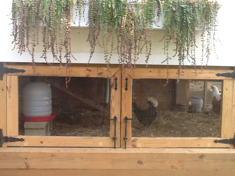 The original door design didn't slide well. We modified to two doors with hinges- works great! Except when you stand up and forget there is a flower box above your head!