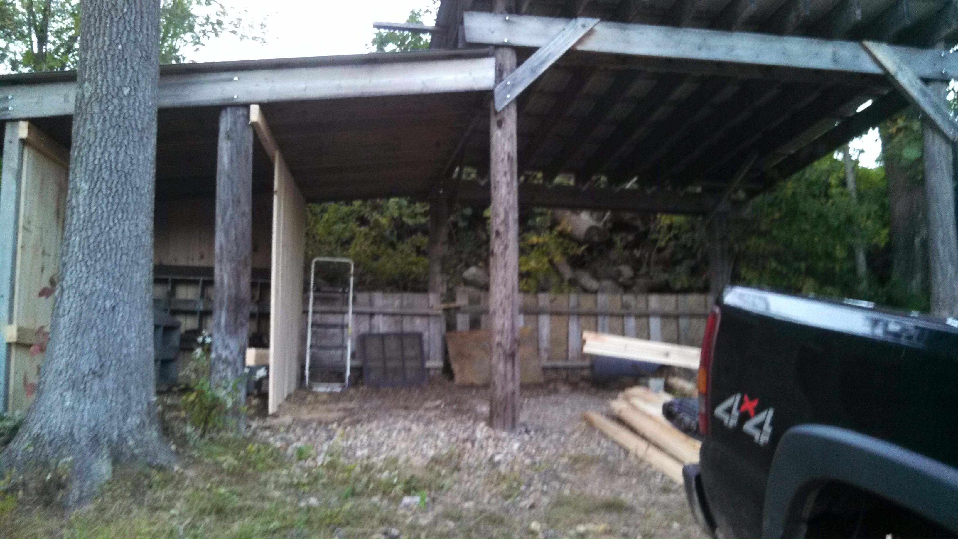 The overhead roofing was there to begin with....up go the walls.