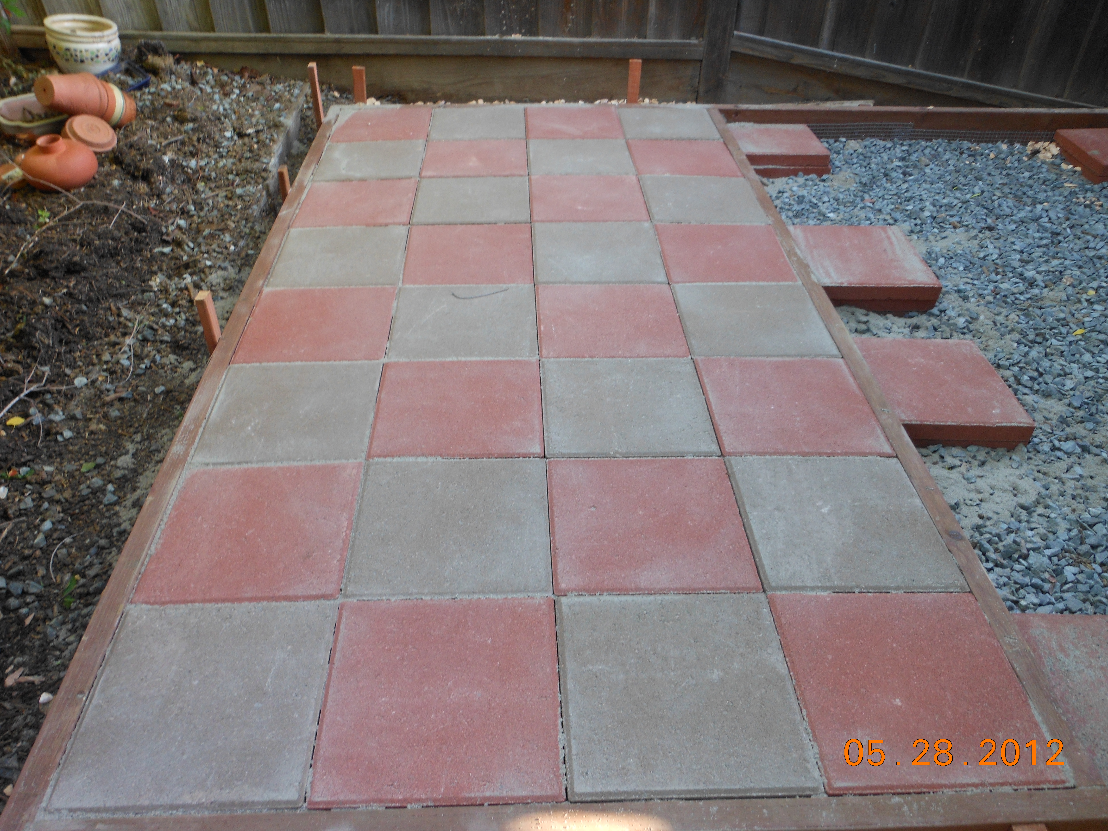 The pavers are finished.  Looks great.  Now just need to form up the other side and pour concrete foundation.  Decided to make inside of run 8' deep.