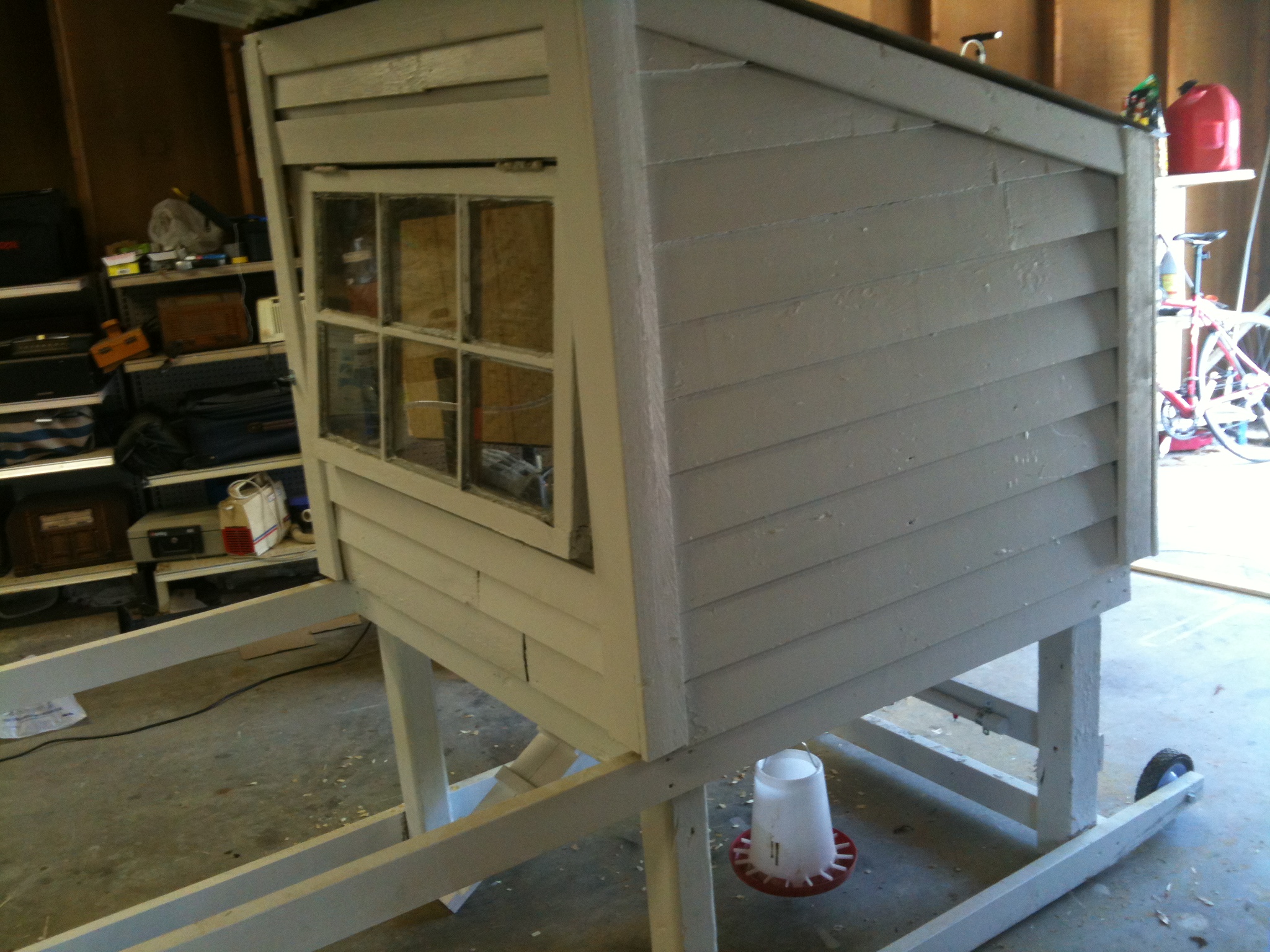 The reclaimed lap siding was a great find and adds a little style to the coop.