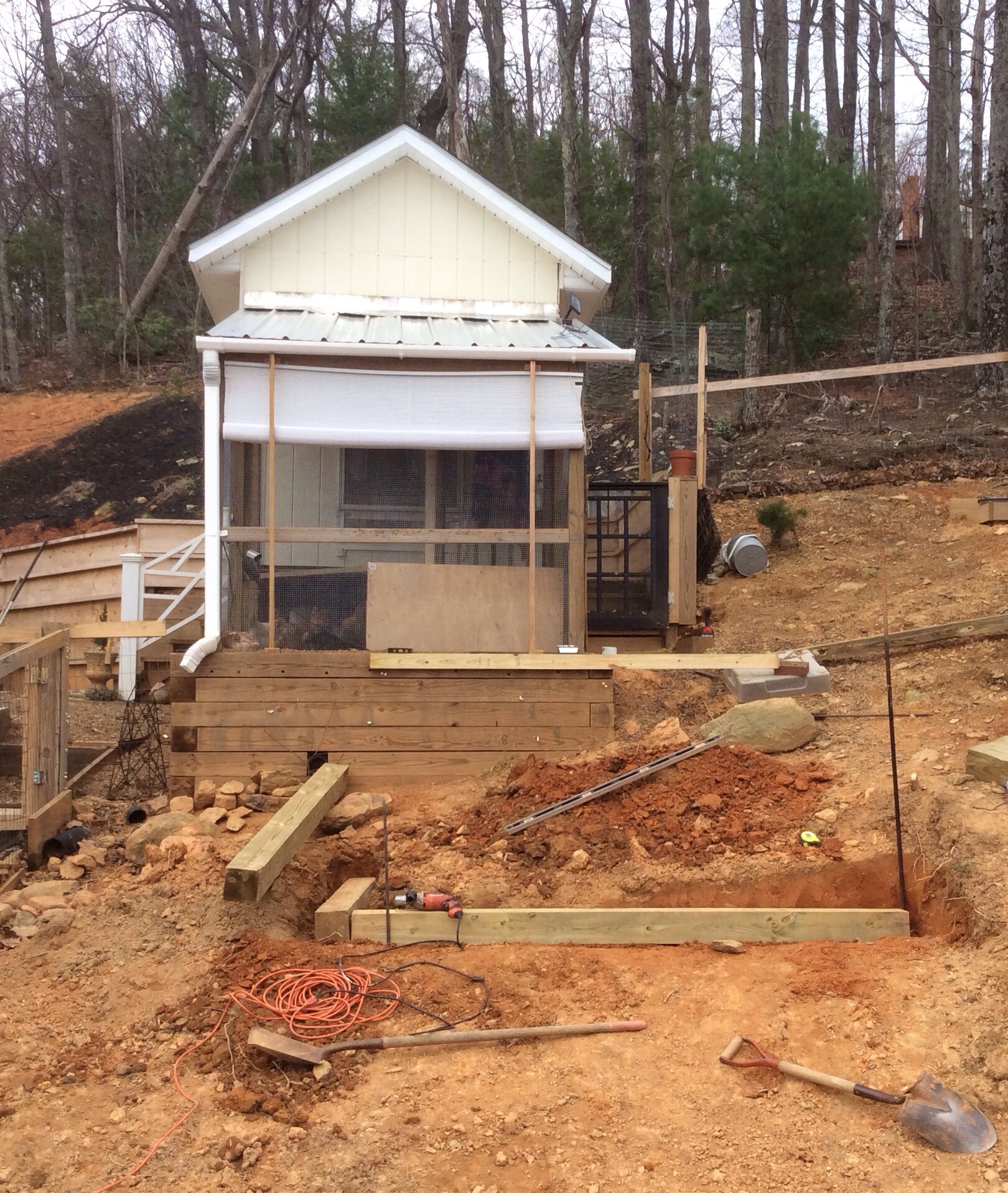 The start of digging the foundation for a coop extention