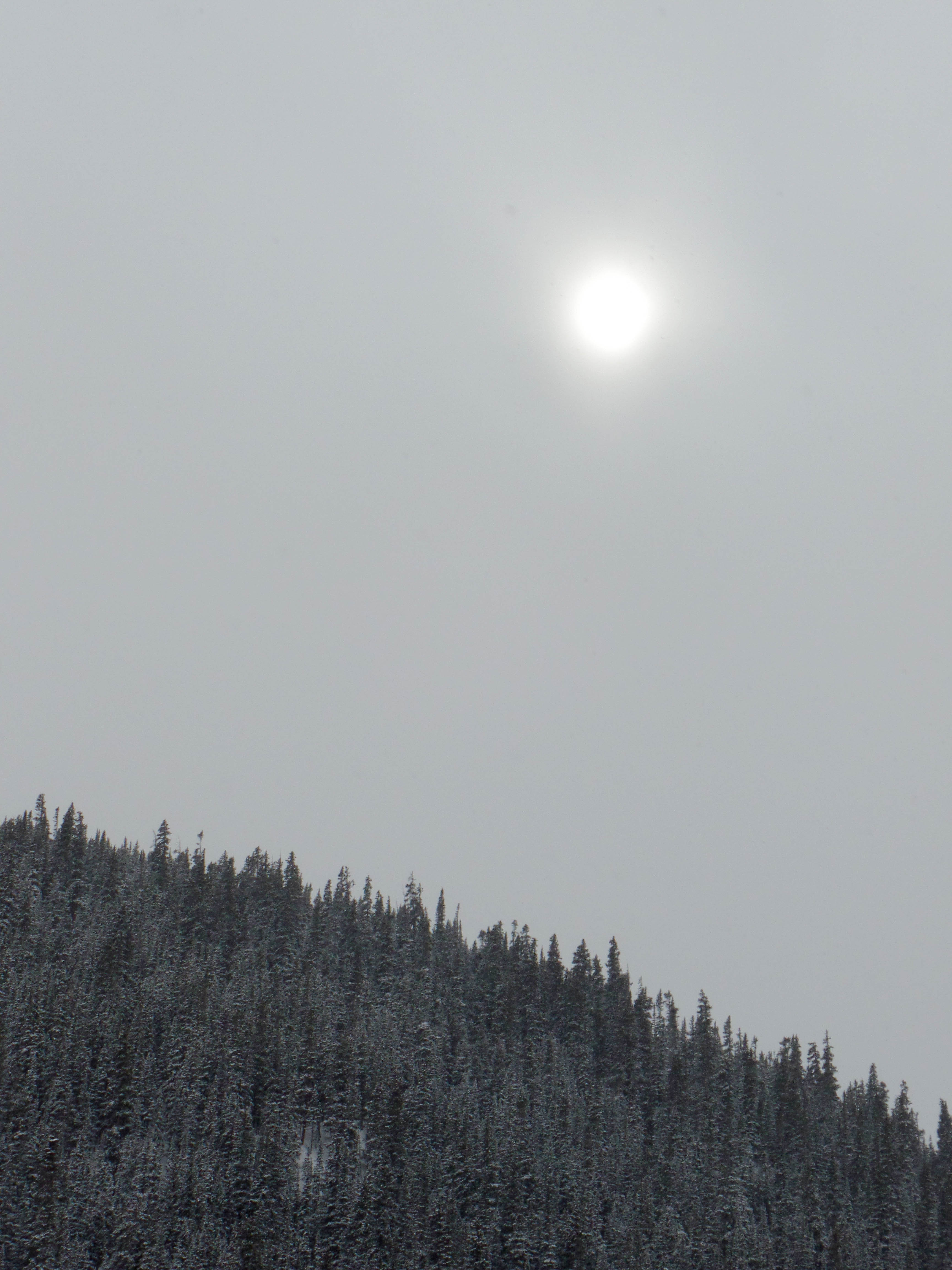 The sun through the clouds in Leadville, CO