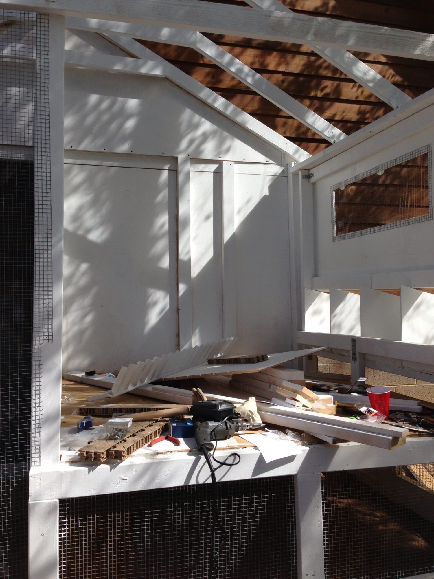 The support brackets for the roof (we used 2x4s & 2x2s) were painted & installed.