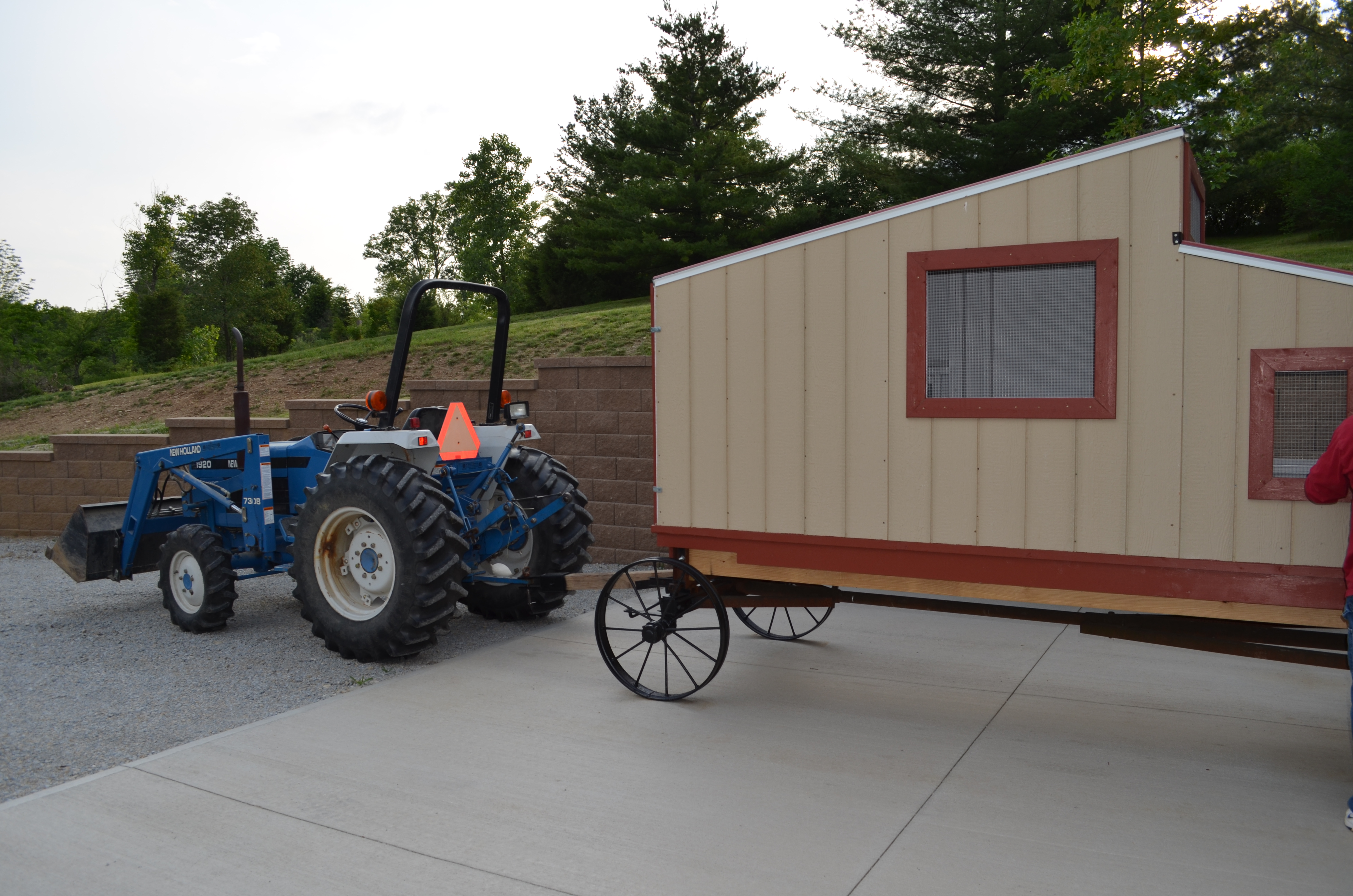 The tractor hooked up to the chicken wagon prior to moving it into position.