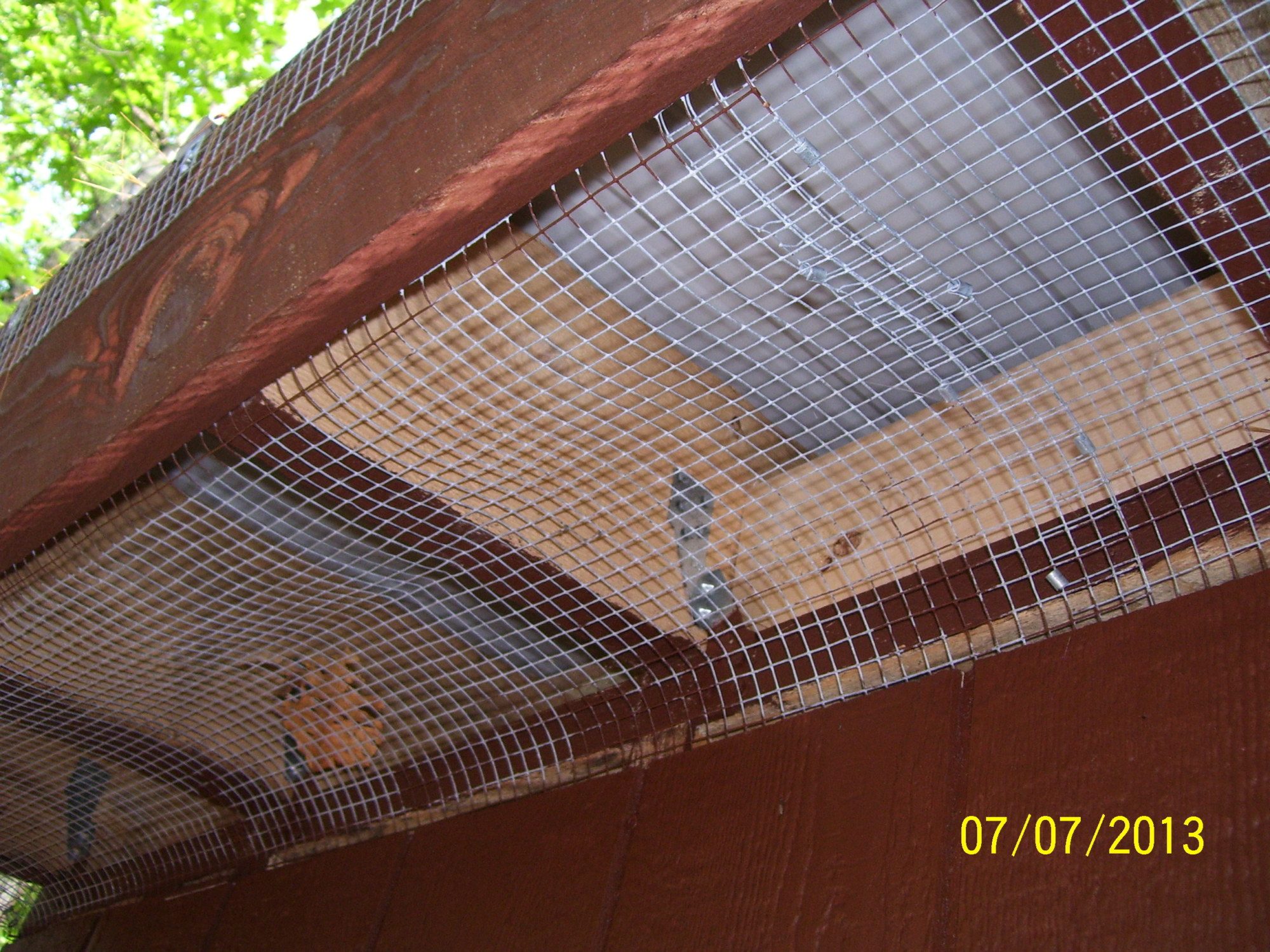 The whole thing is wrapped in 1/2 inch hardware cloth. This is the "soffit."