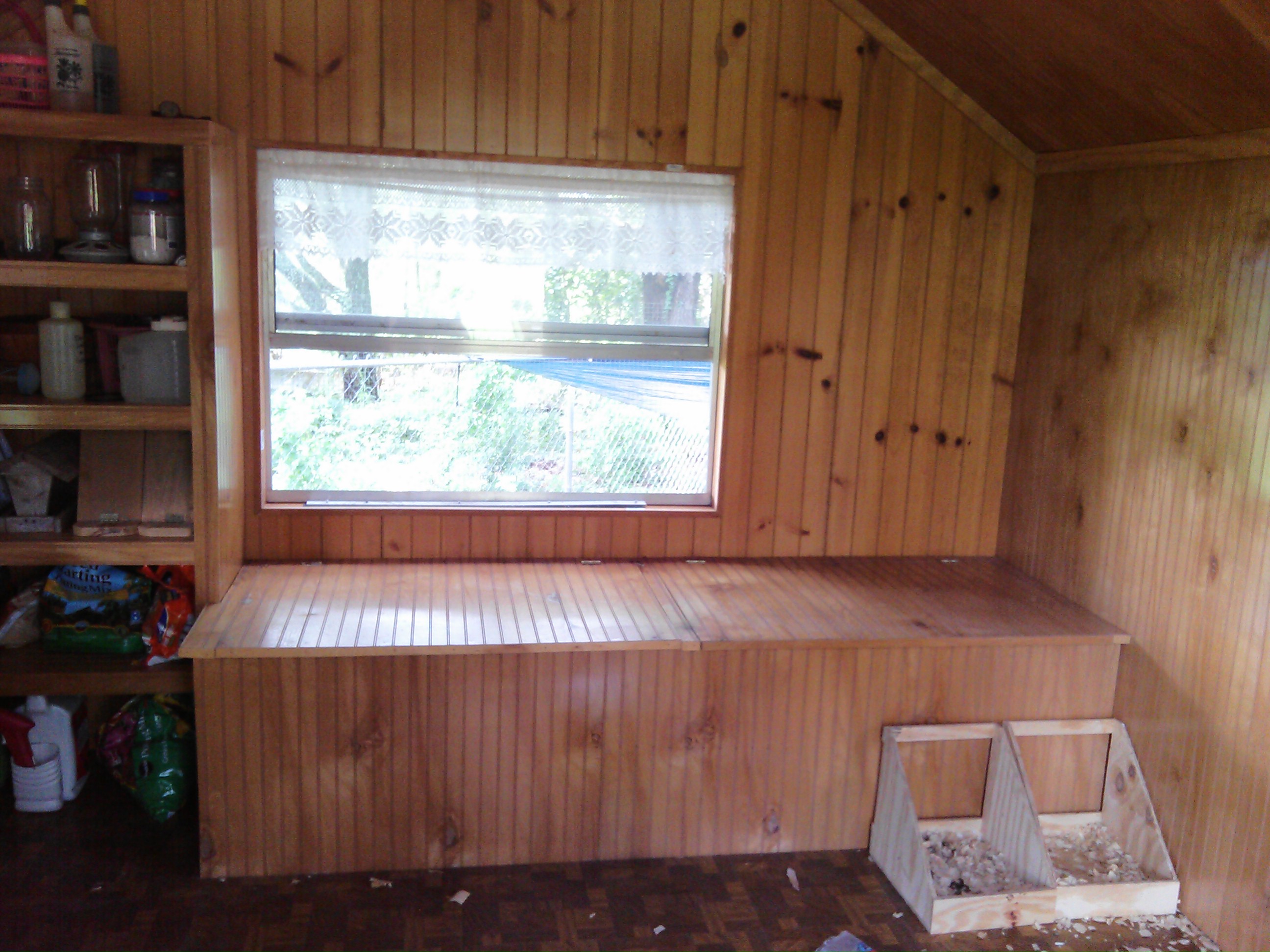 The window seat will be used for storage of the pine shaving a DE underneath and the poop boards will be placed on top.