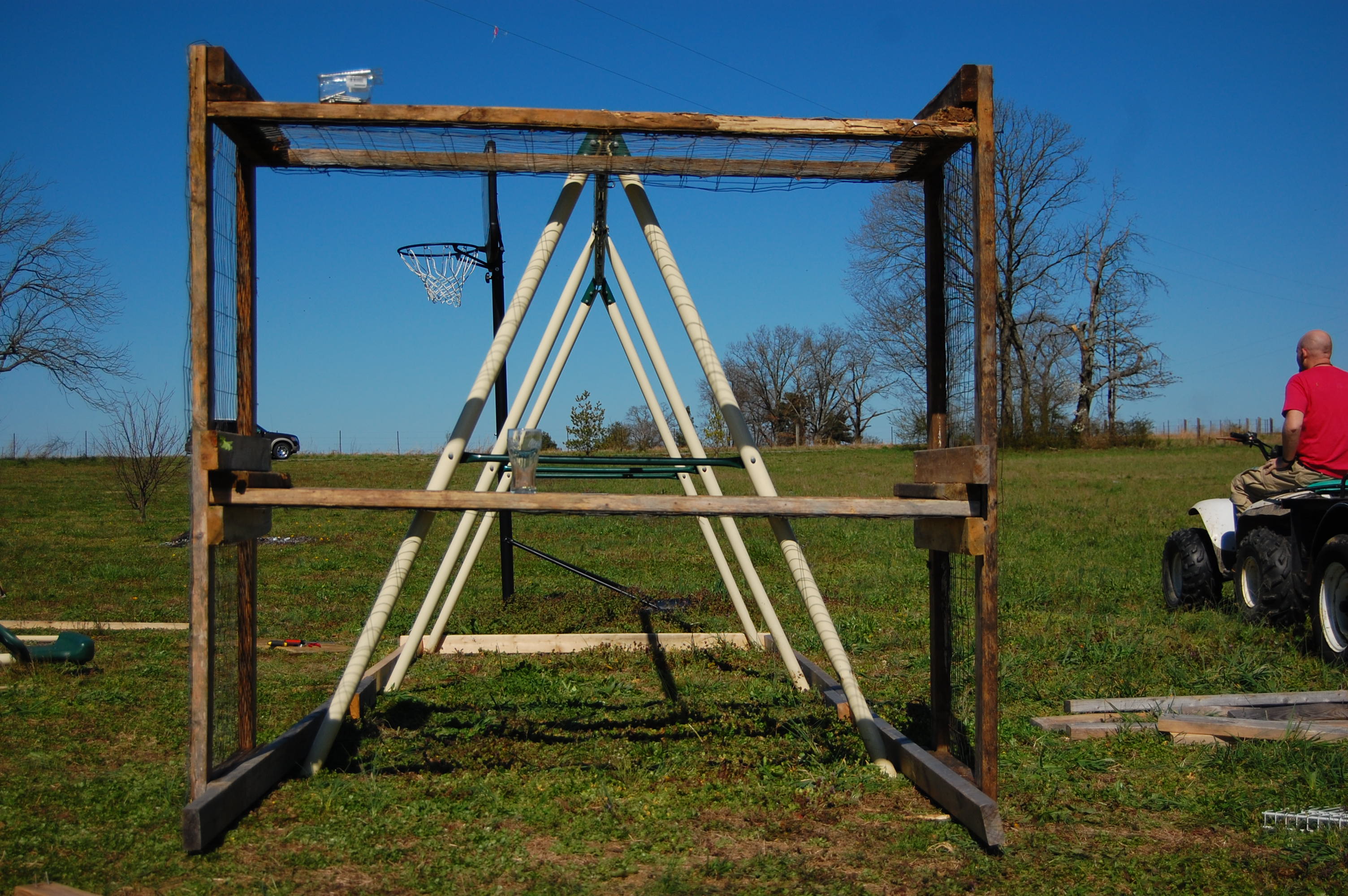 The wooden square part was once on it's side and held 14 puppies that my beautiful english yellow lab created with multiple neighborhood freinds, DOH! As you can probably tell, the girls old swing set was sacraficed for our new run as well. We were planning on about 6 hens at this time.