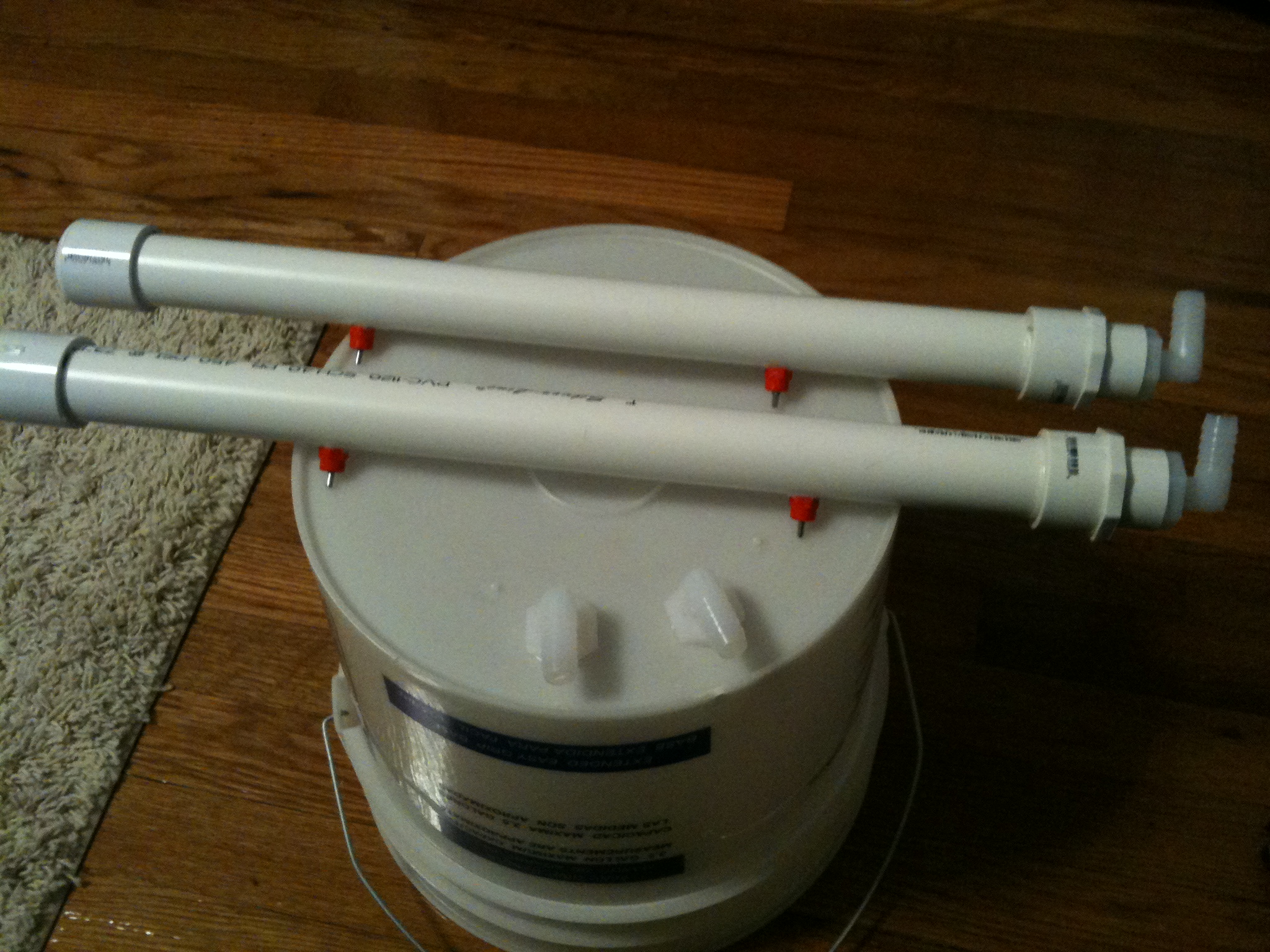 This automatic waterer is the part I'm probably most proud of...beside the decision to keep chickens in the first place. I hated the idea of having to clean out a poop-filled waterer a few times each day, and given the fact that my wife and I travel a good bit, we knew it just wouldn't be possible sometimes. So this solution allows the girls to have fresh water whenever they need it, and we just have to fill the bucket every couple of weeks or so.