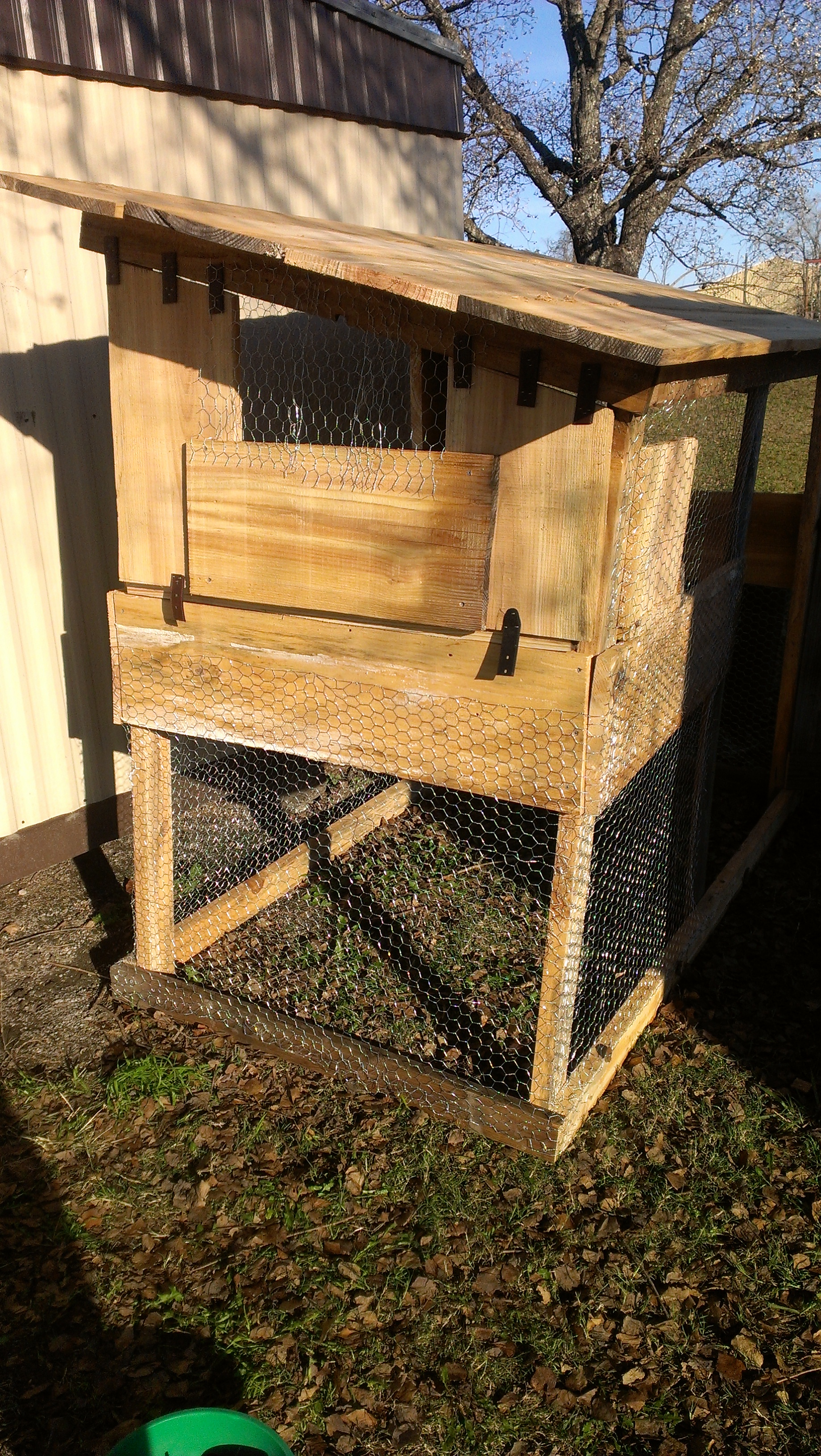 This coop is mostly reclaimed lumber; some rough-cut directly from my landlord's small pine mill. 8'x4' base, 6'-5' roofline. The hinges and latches for the cleaning door and main door are made of belt leather. Used ~128 sqft chicken wire. Nesting box separate from roosting area.