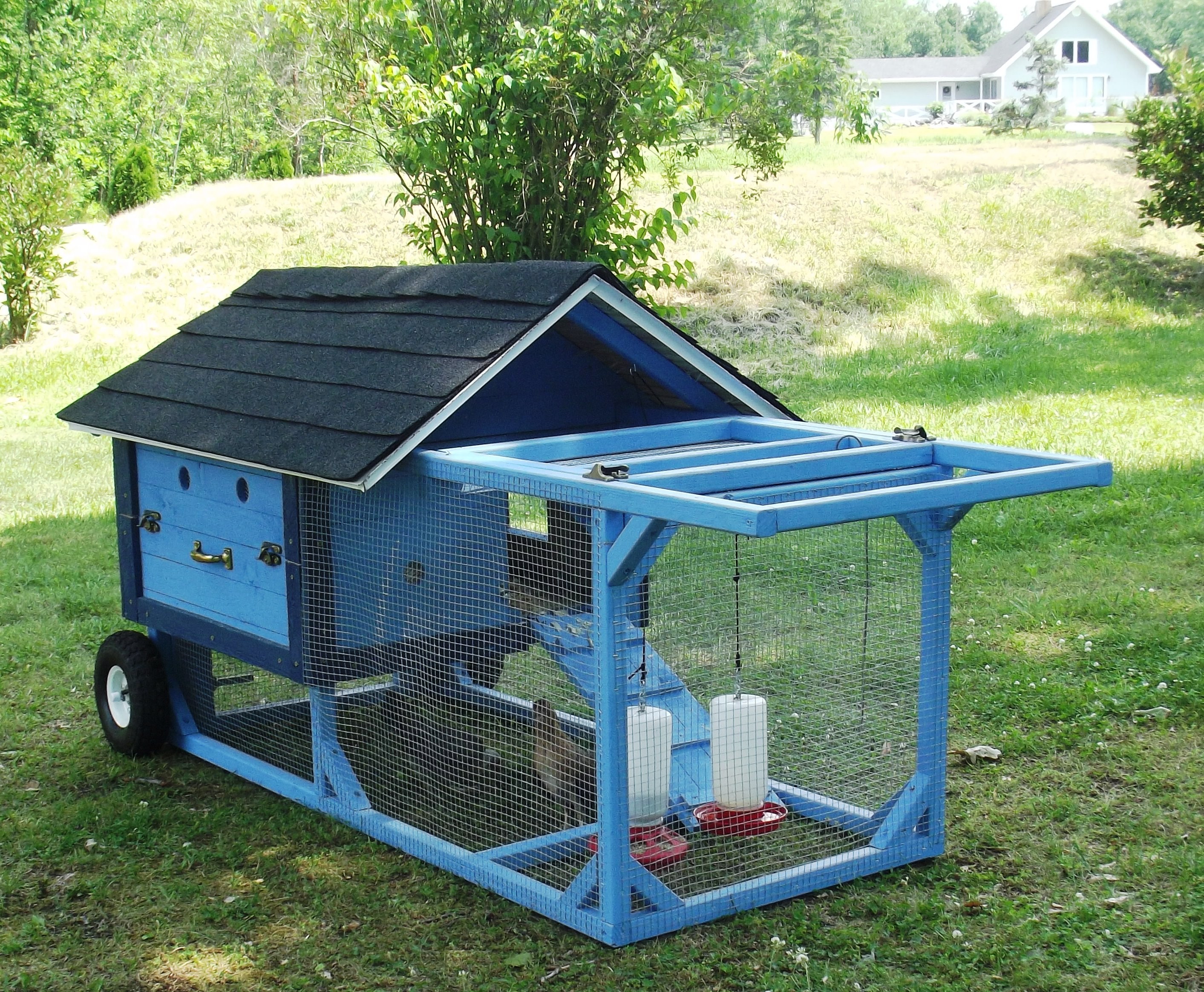 This coop/tractor was built for my MotherIn-Law. t holds 4 Banty's. Dimensions (approx) 
8' x 2 1/2' x 3'.