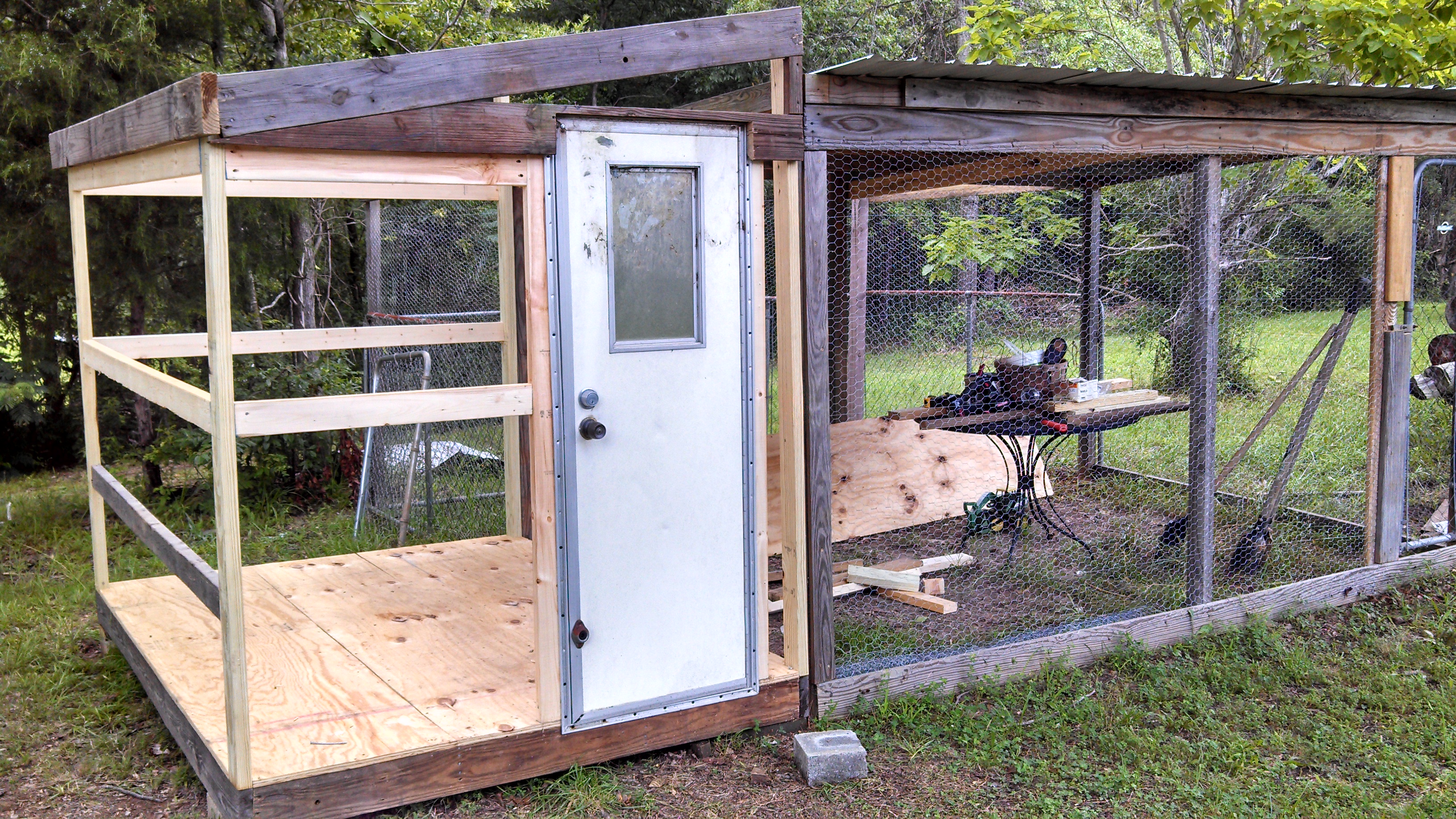 This is a door off a camper trailer that was repurposed. I also framed the external nesting boxes in.