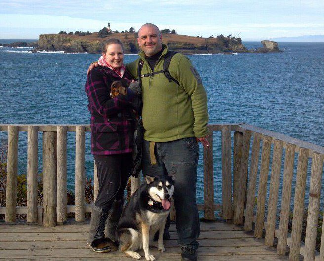 This is a photo of my boyfriend and myself with our dogs, Ollie the basset hound and Tosha the husky mix.  We were at Neah Bay, Washington