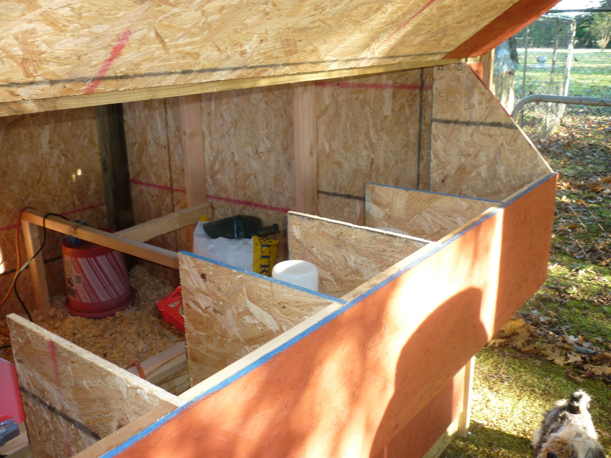 This is a view from the back of the coop.  The door can be raised for easy access to the nesting boxes to remove eggs without having to go inside the coop or the chicken run.