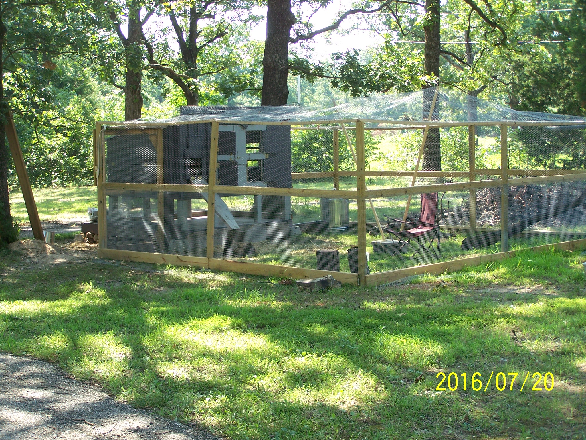 This is our coop and run coop 48 sq ft, run somewhat over 250 sq ft (it's not quite square lol)