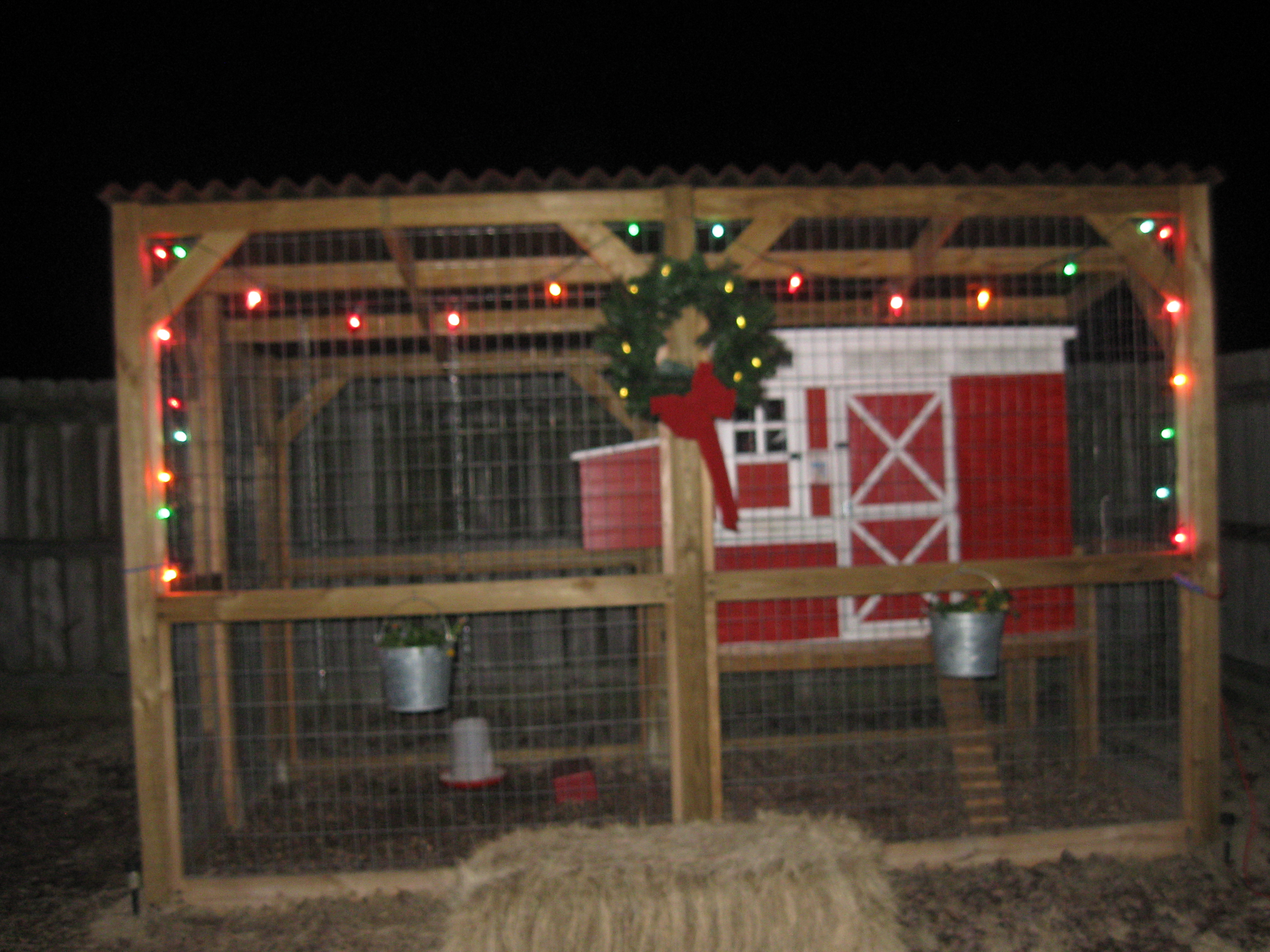 This is the completed coop and run after expansion. The run is a copy of one I found here, I think it's Coop de Ville.  I saw it, loved it and gave our builder a photo. They copied it exactly and I love it ! The barn doors on the coop are my favorite. Now our girls are safe and snug on cold nights. All we need to do is hang stockings for Santa.