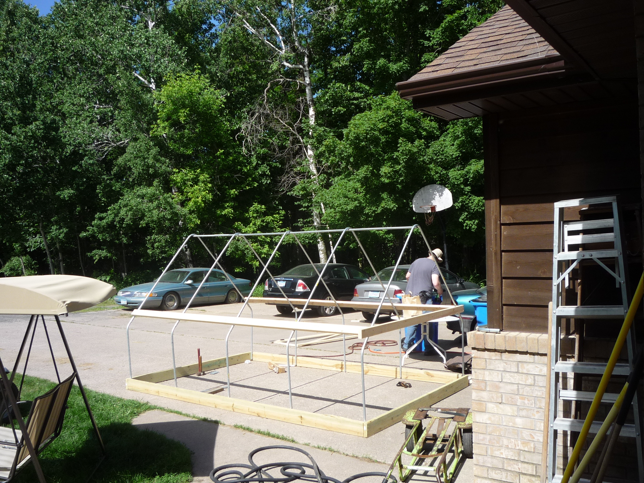 This is the frame. The hoops were formed 3/4" electrical conduit, 2"x4"s, and 2"x6"s.