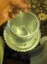This is the inside showing a 1/2 inch gap between the coffee can and the pie plate.