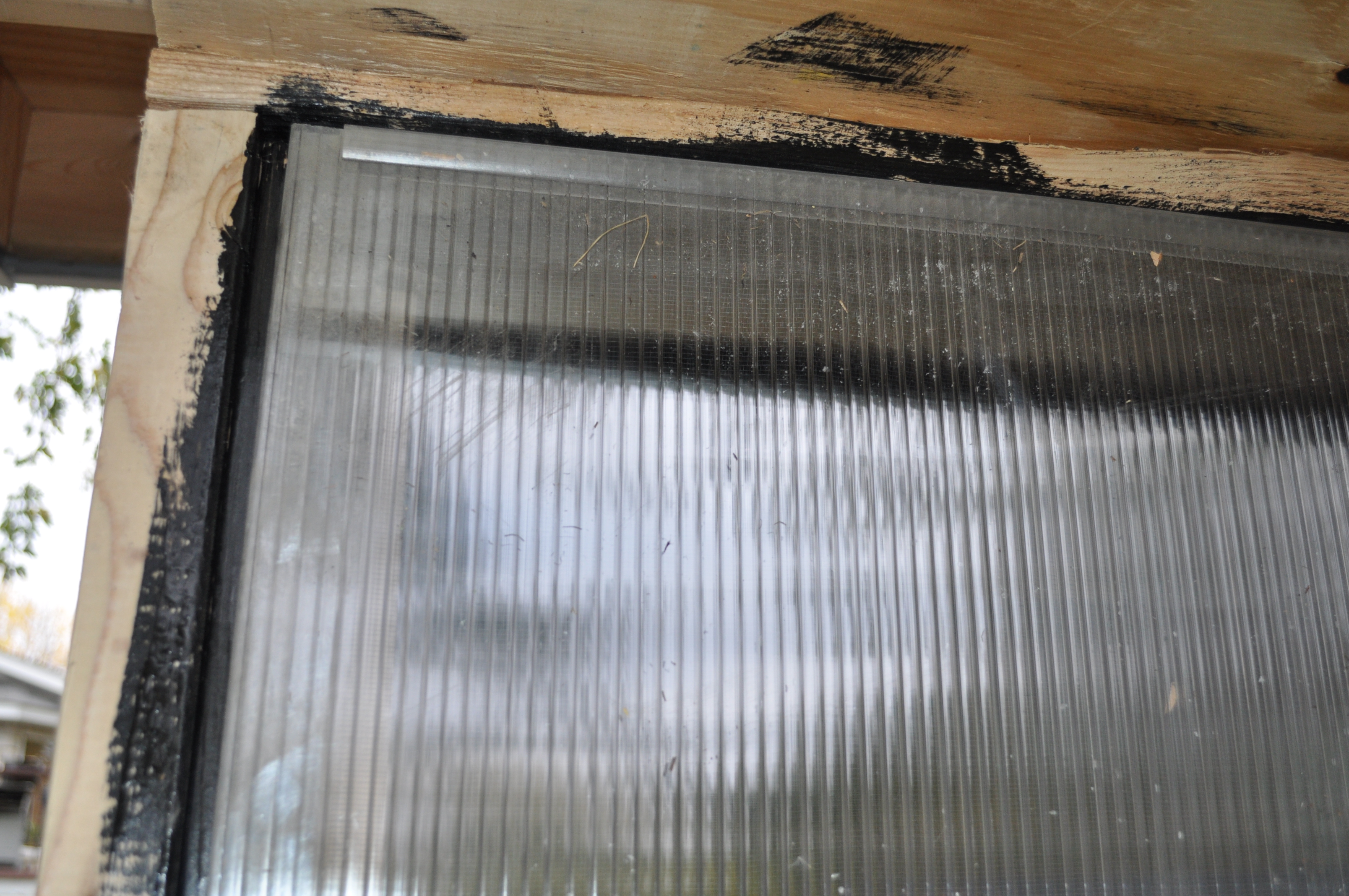 This is the outer layer- translucent to let the sun warm the air inside.
