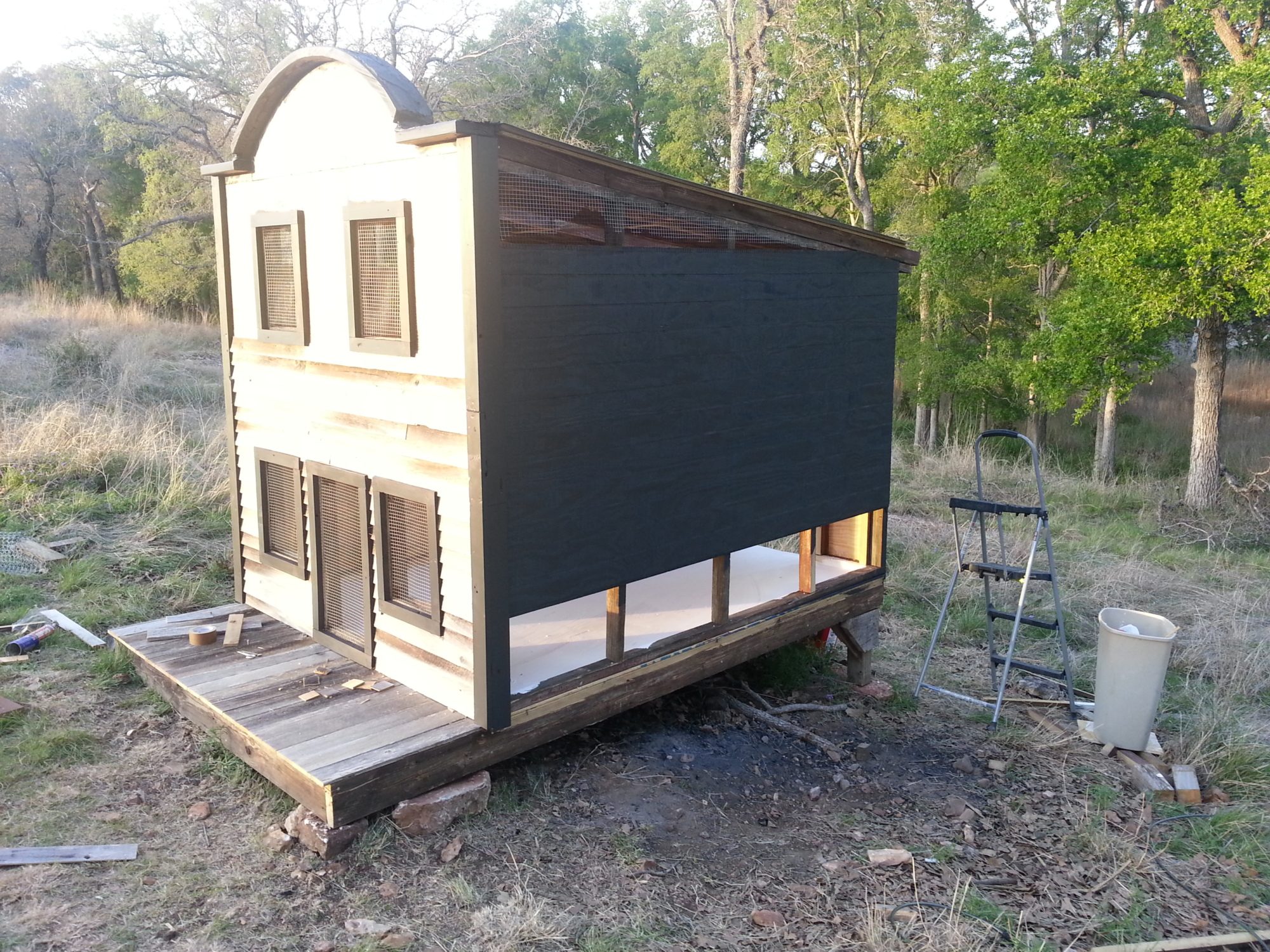 This is the side that will have the nesting boxes.  That's why you see the open area at the bottom.  They've not been built and attached, yet.