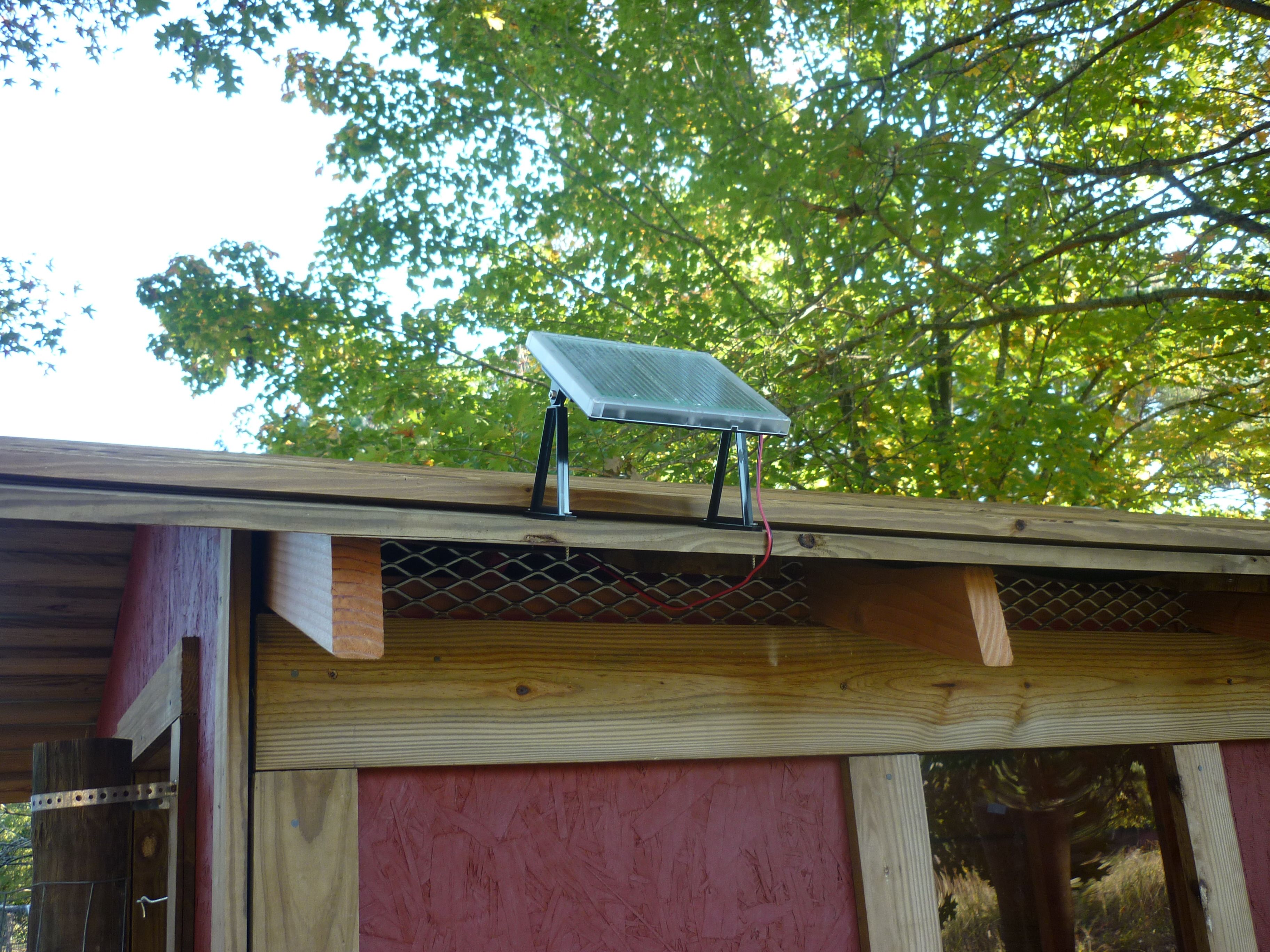 This is the solar panel for the automatic door.  Notice the vents under the roof.  There are vents under the nest boxes and around the sides too.  During the winter, the larger vents are covered with cut pieces of 2x6 boards with screws.  The screws can be backed out and the boards removed during the summer for air flow.