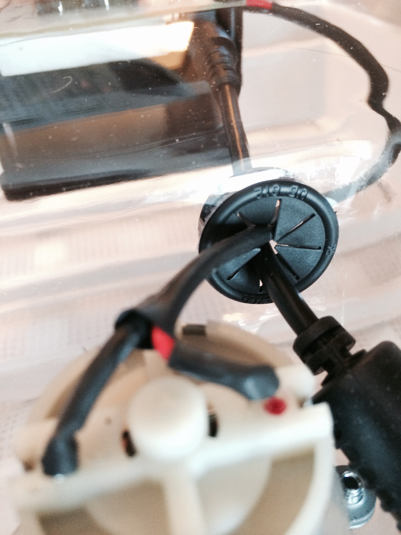 This is where the cords go through the lid on the incubator to the motor and then out to the AC adapter and plug.