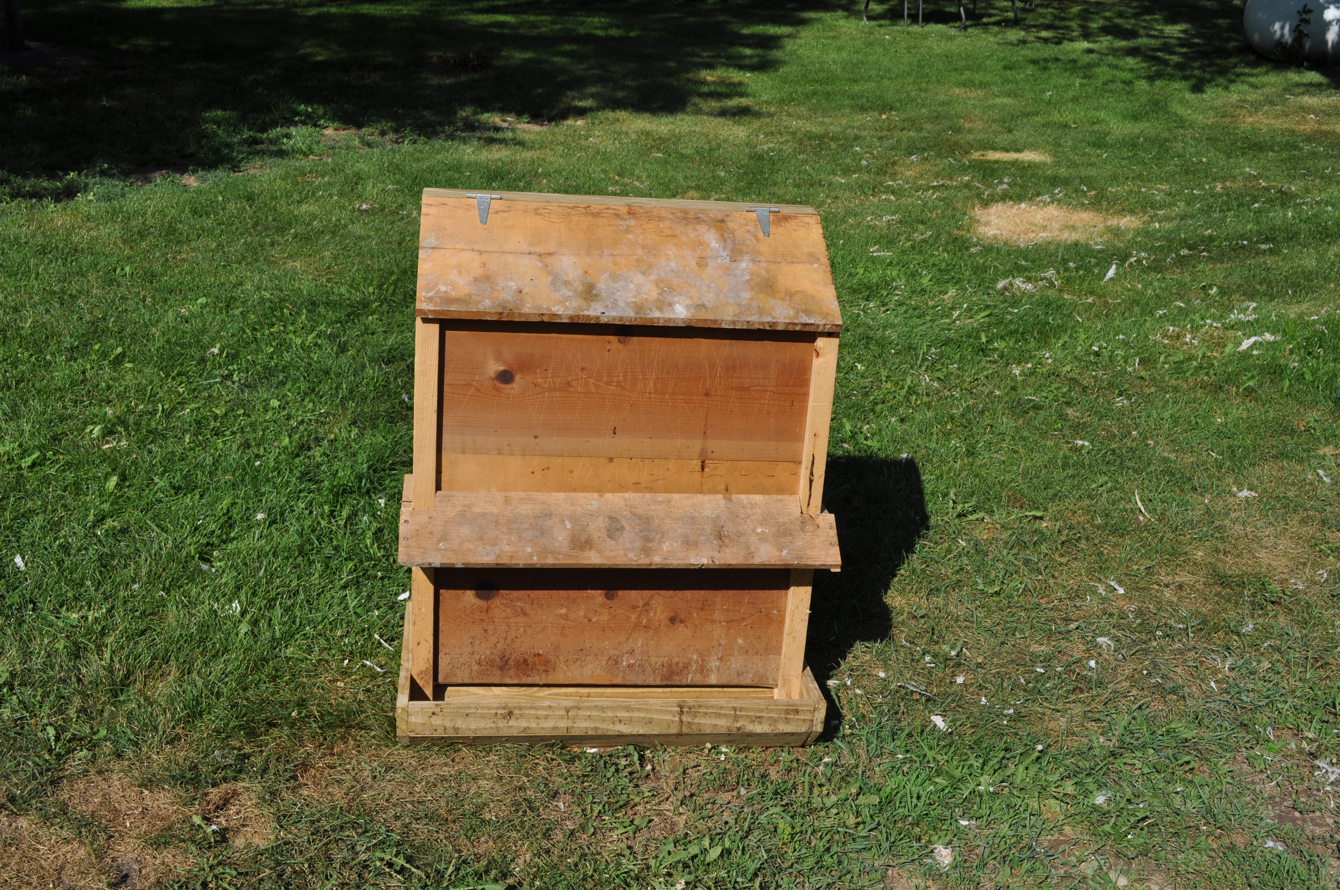 This only looks crooked because of the ground it's sitting on