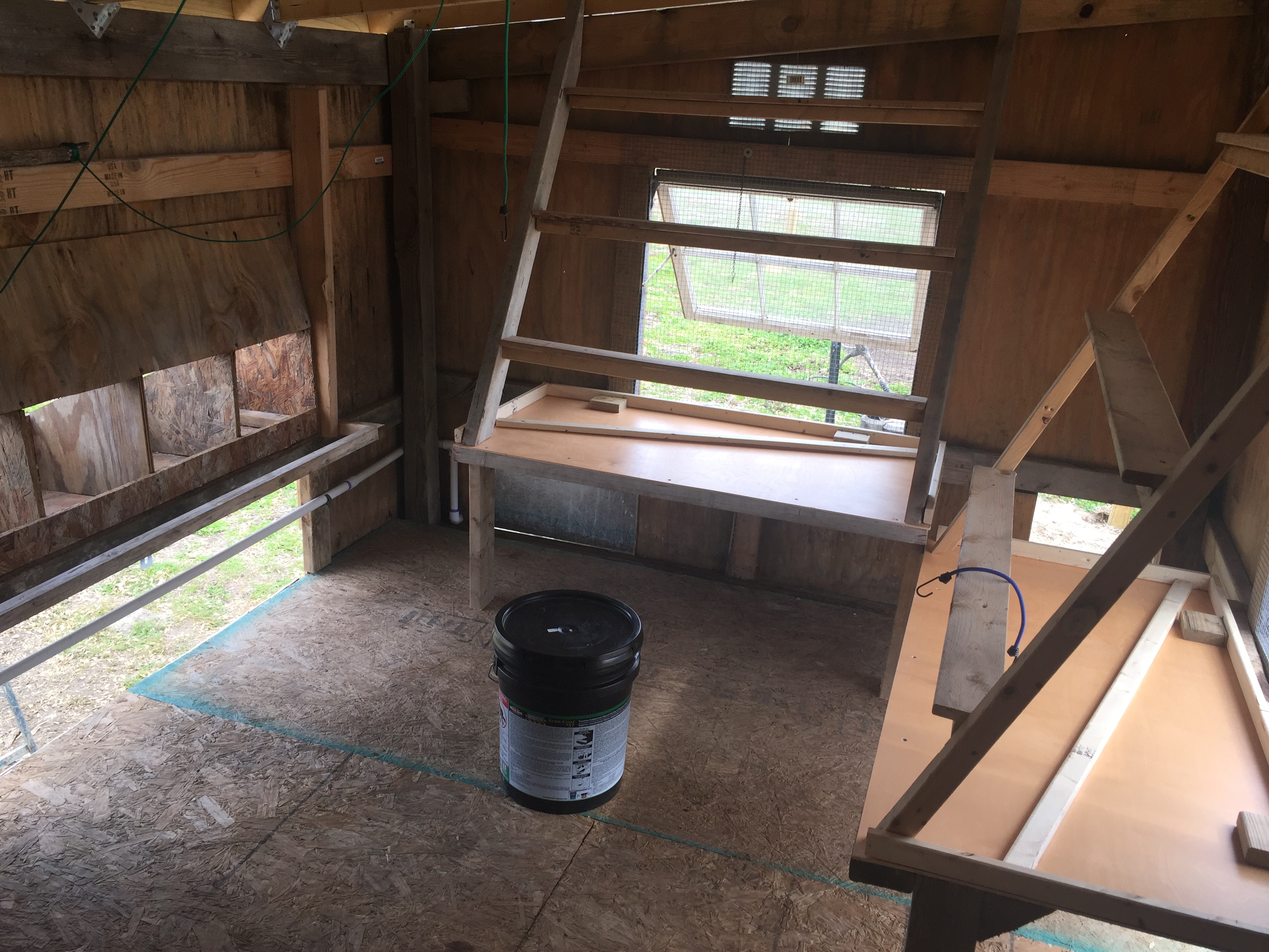 Todays progress, both roost and poop boards completed. A front lip was added to poop boards that are hinged. Lip will fold down to help with completely cleaning the poop boards off. Poop boards were elevated as to not take up precious floor space.