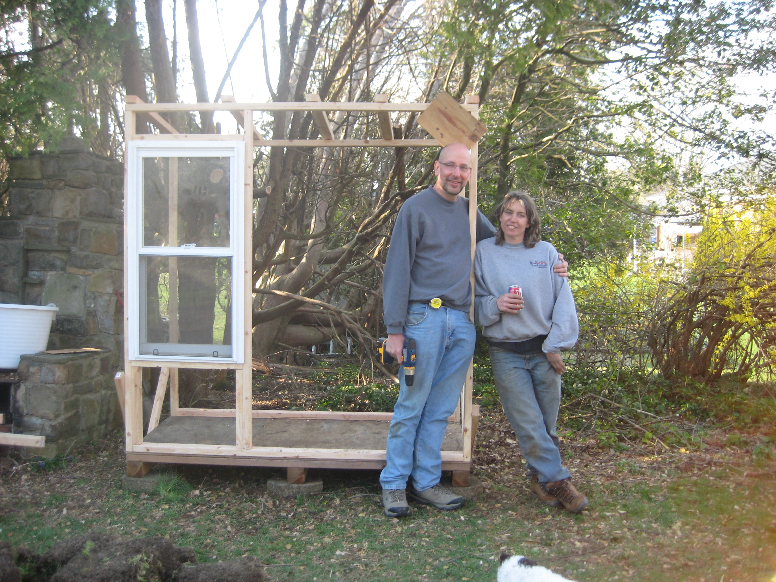 Tonya and Bob after a  hard days work framing the  coop