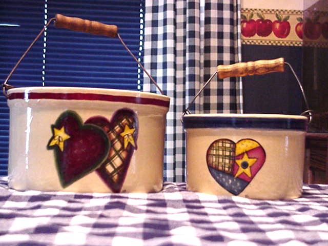 Two baled crocks with custom country hearts.