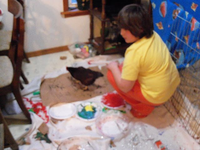 Two of my kids making wrapping paper