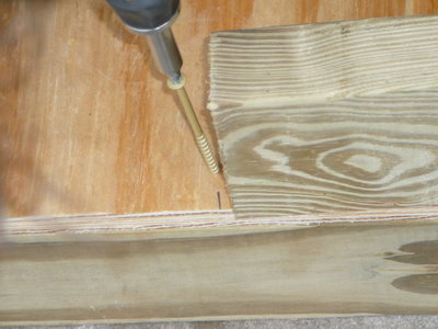 Use a piece of 2x4 scrap to make sure you hit the joists in the center as shown.