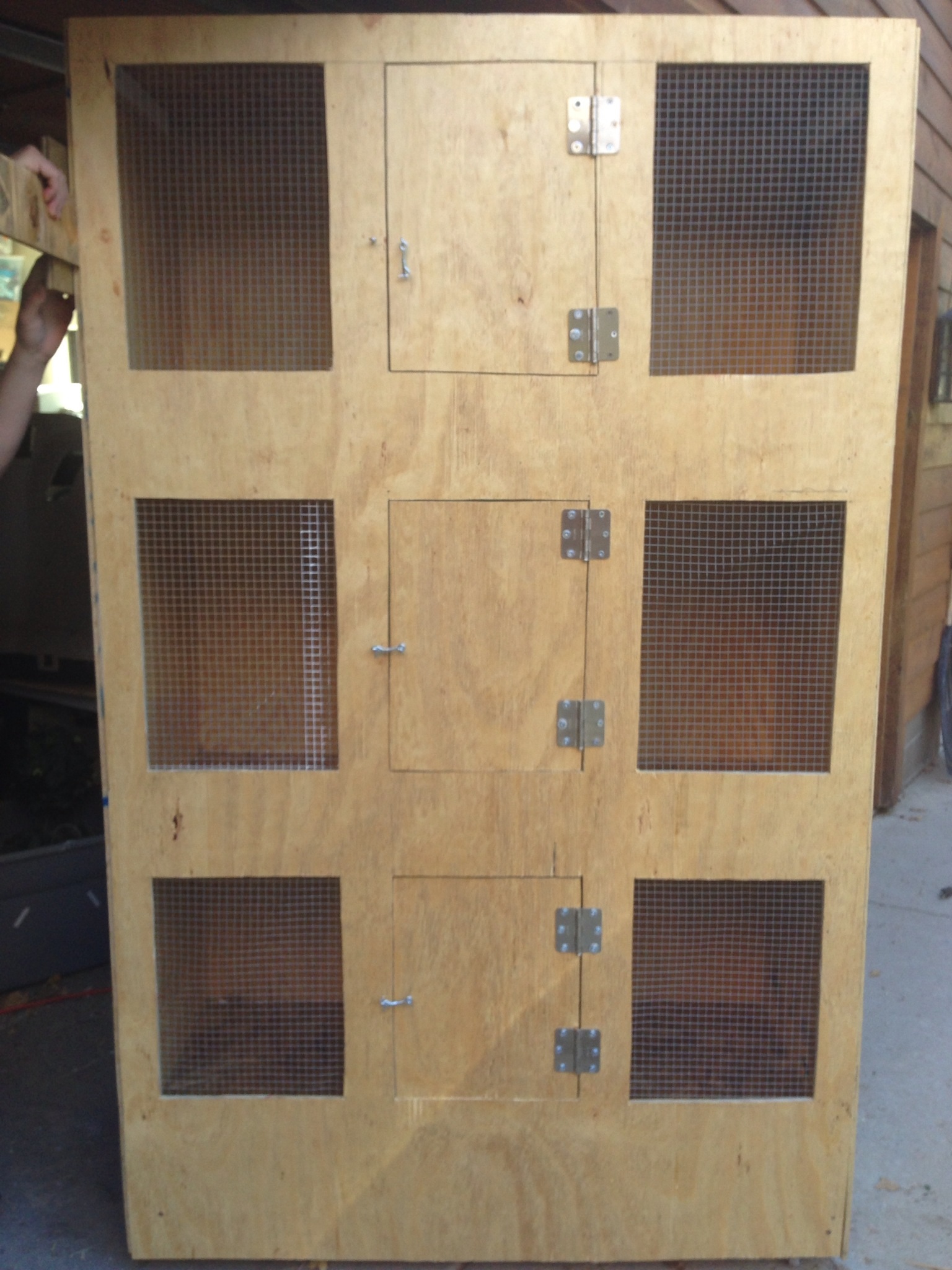 Used 1/2x1/2 hardware cloth for the windows & pkaced the doors in the middle for easy reach on either side.
