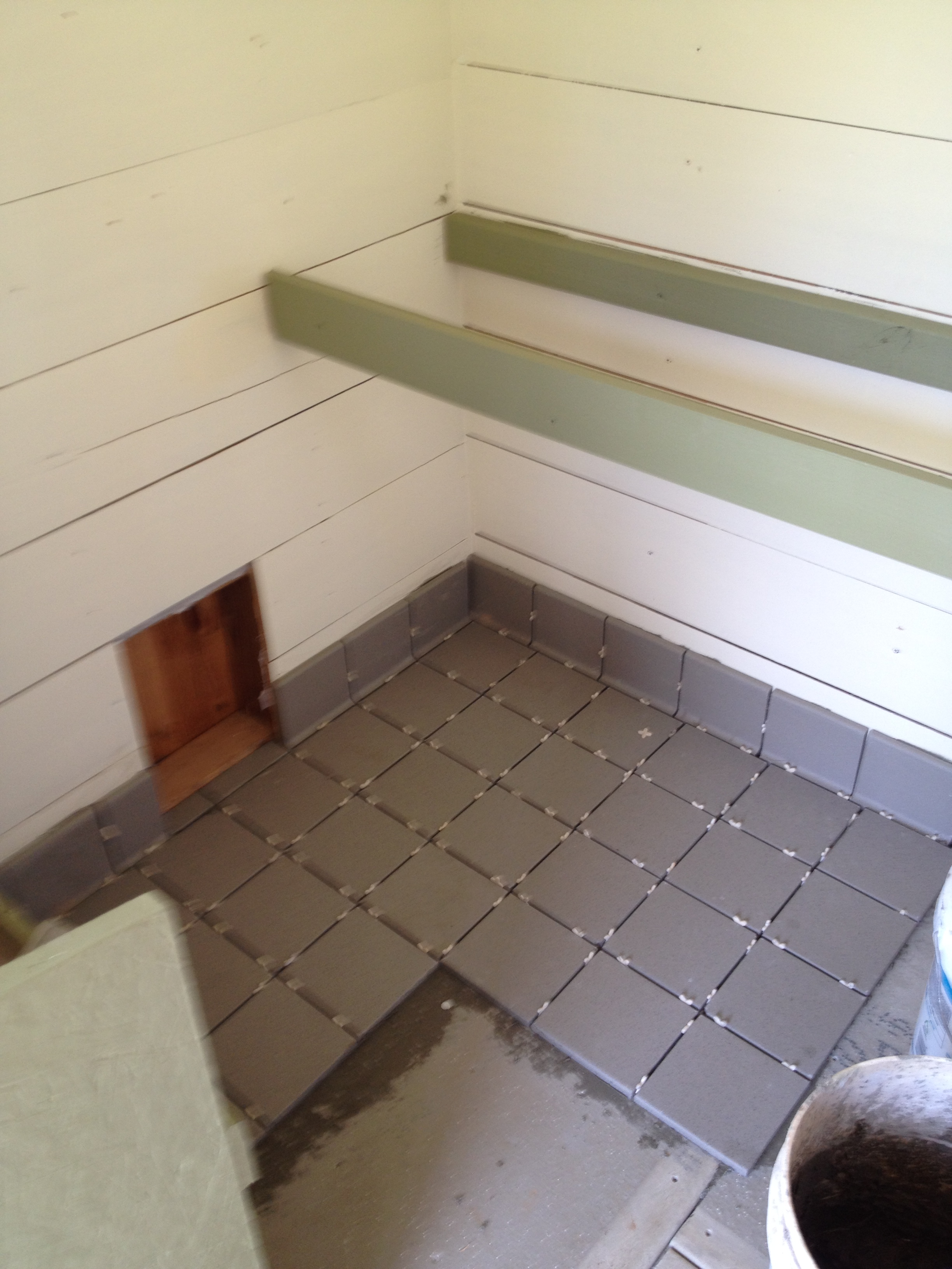 Used some leftover tile from a job. Works great, just hose it out in the spring and fall.