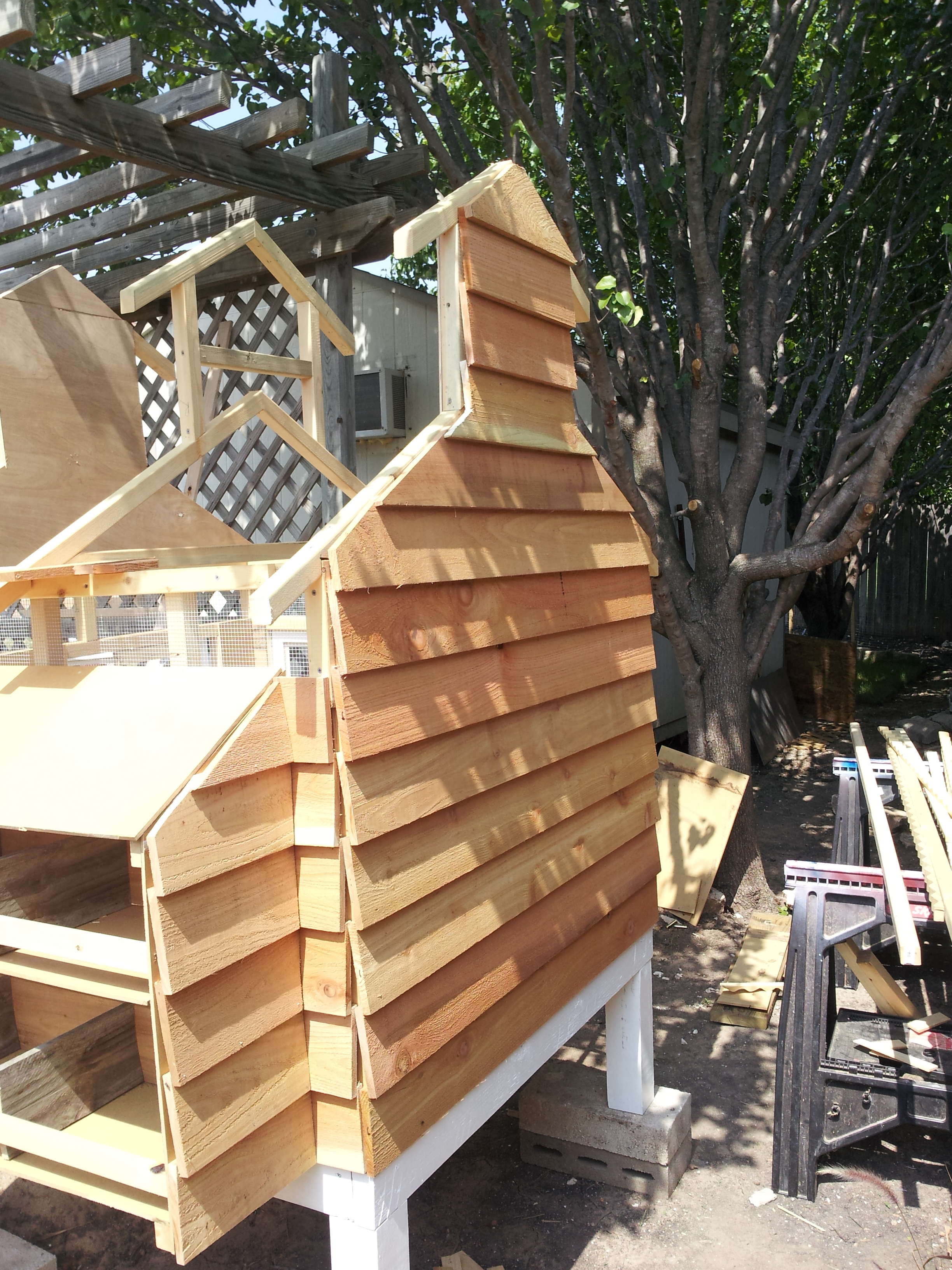 using cedar fence pickets as our siding, once completed will use a cedar stain weather protection