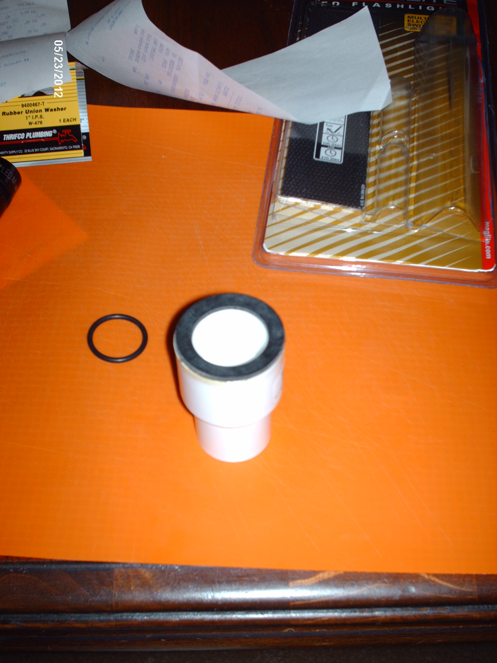 Using Devcon Rubber Adhesive, glue flat rubber washer to edge of LARGE end of coupling. This is the side where you will place the egg. The rubber washer is a little wider in the inside dimension so the rubber washer will mold nicely to the egg to seal the light.
Pkg of 1@ 1" Rubber Union Washer =  $.79