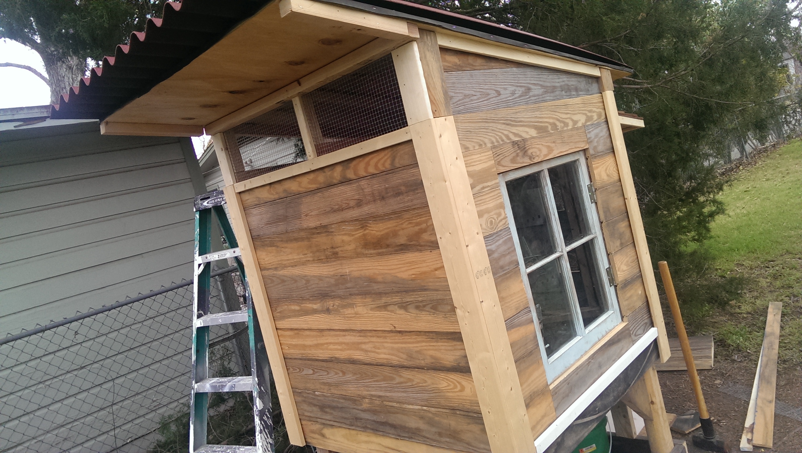 Ventilated roof line for our Texas weather. All the siding is tongue and groove pine siding that my hubby rescued from a dumpster on the UT Campus that had streamers and sequins stapled too it from a parade float that was torn down. My boys helped us prep it by pulling out staples and nails.