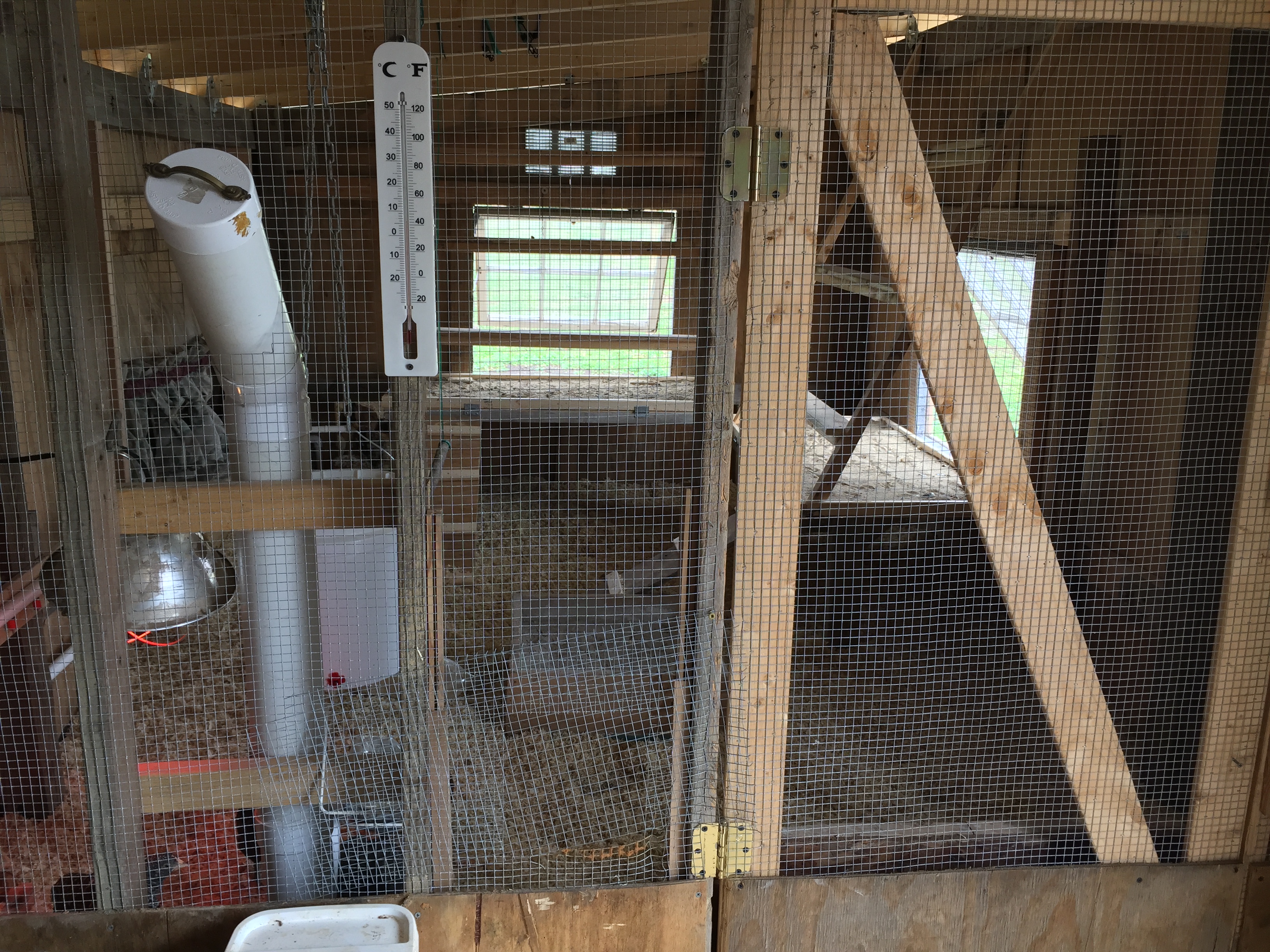 View looking in from the storage area. Put a spring on the interior door to help keep it secure and a few other odd and end things.