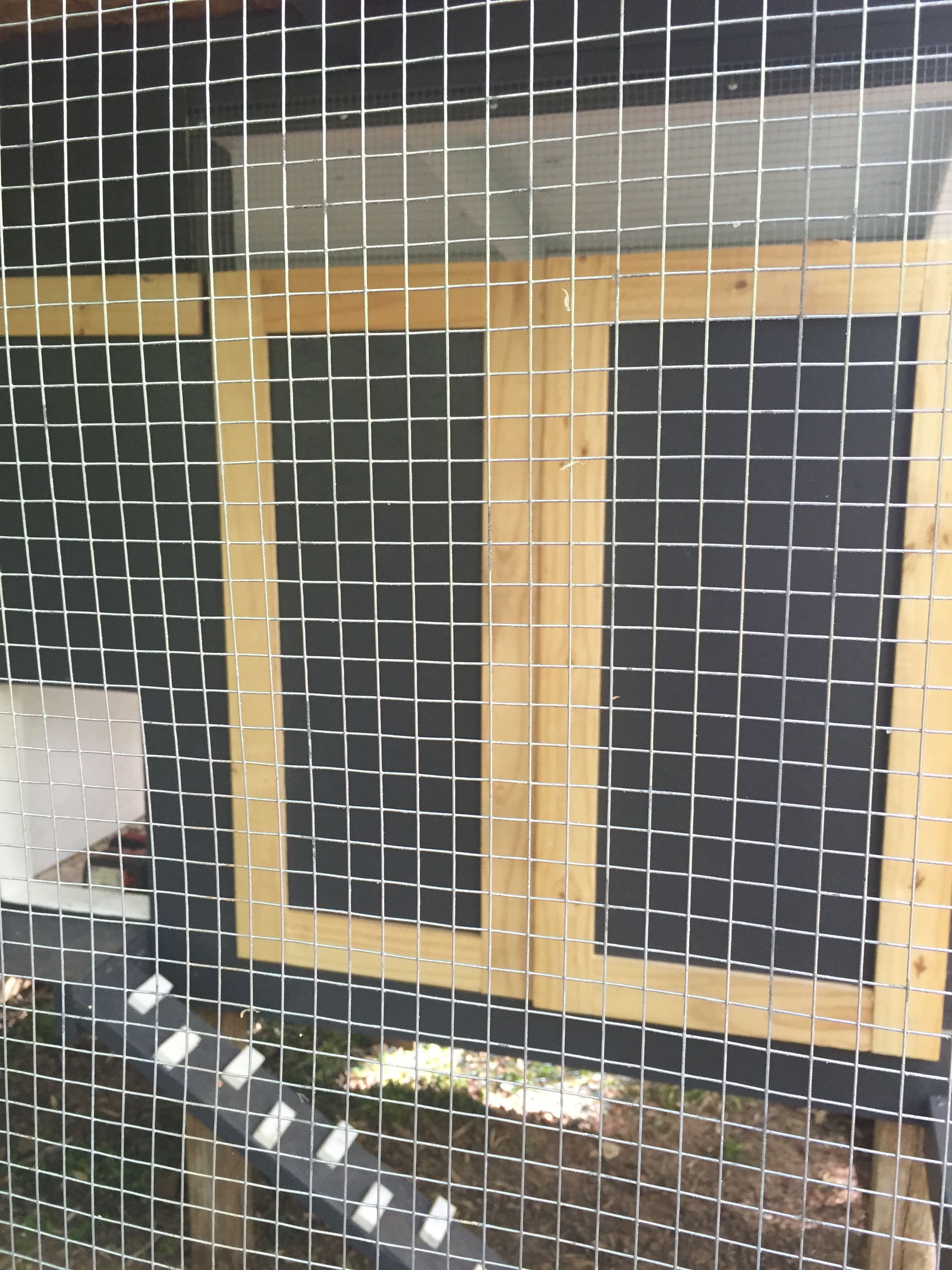 View of Clean out doors from behind the hardware wire run