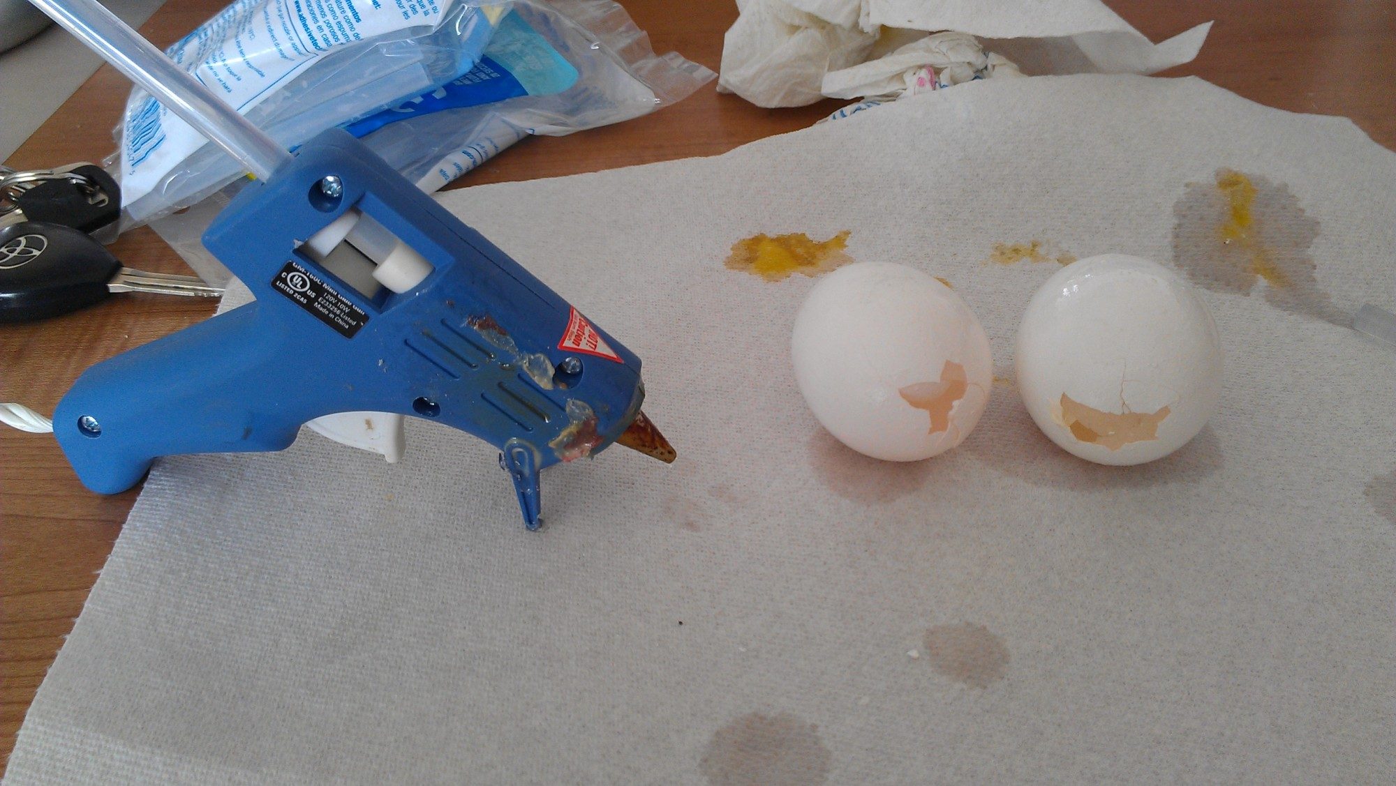 Wash the interior of the egg and let it dry to begin filling the egg with hot glue