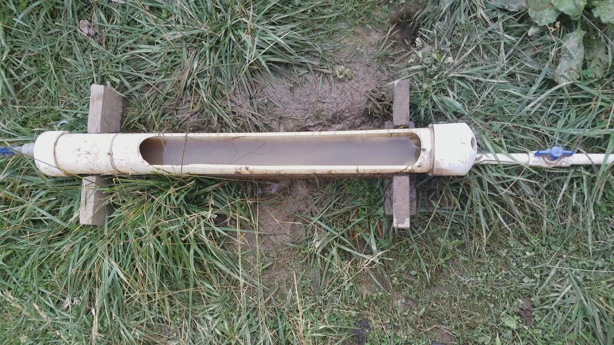 Waterer in a muddy pasture