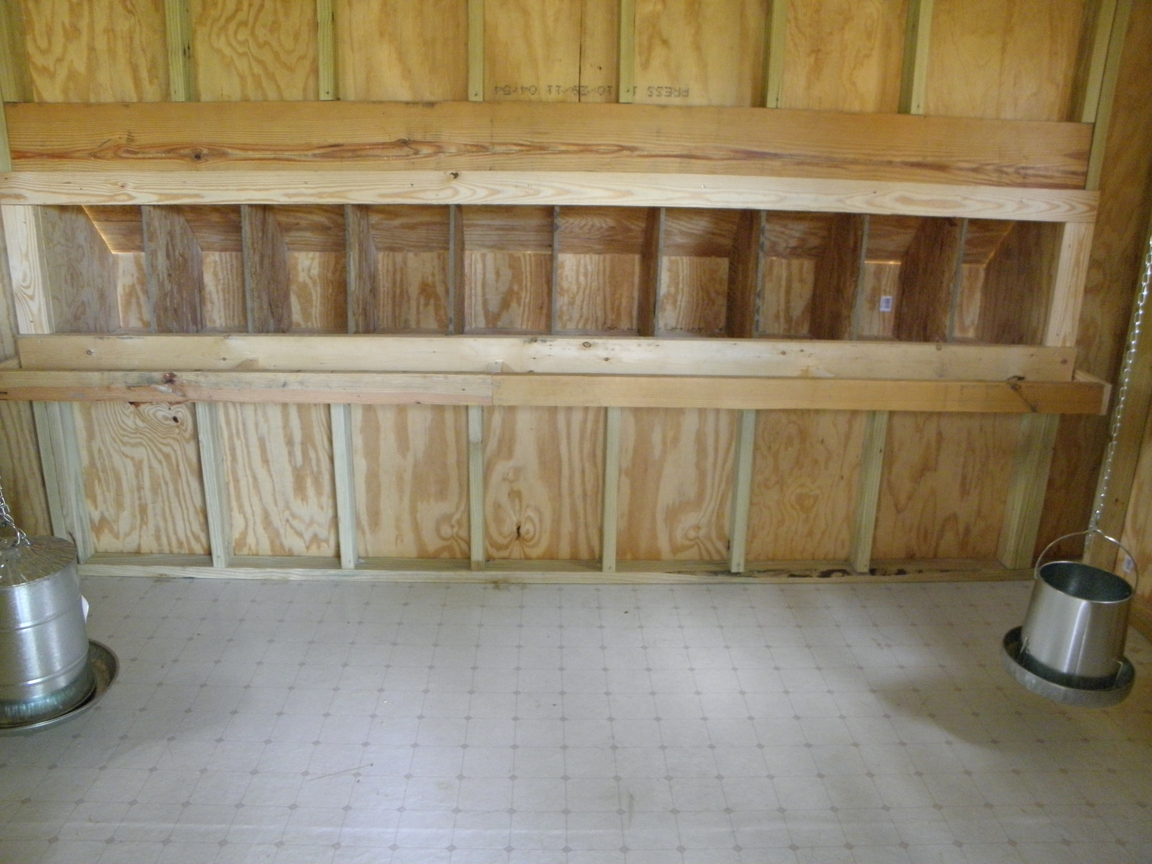 Waterer on the left and feeder on the right.
