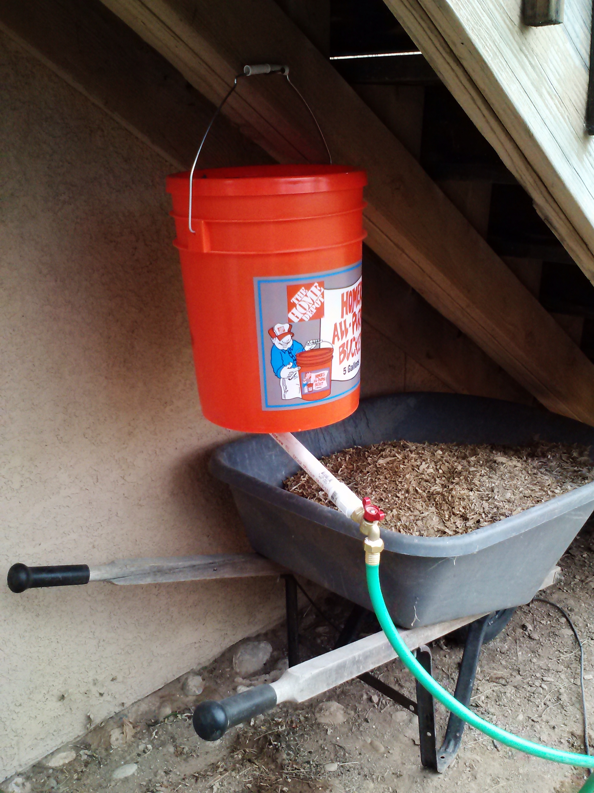 Watering system my husband made after I found this tutorial....http://sharidenise.hubpages.com/hub/Watering-Chickens