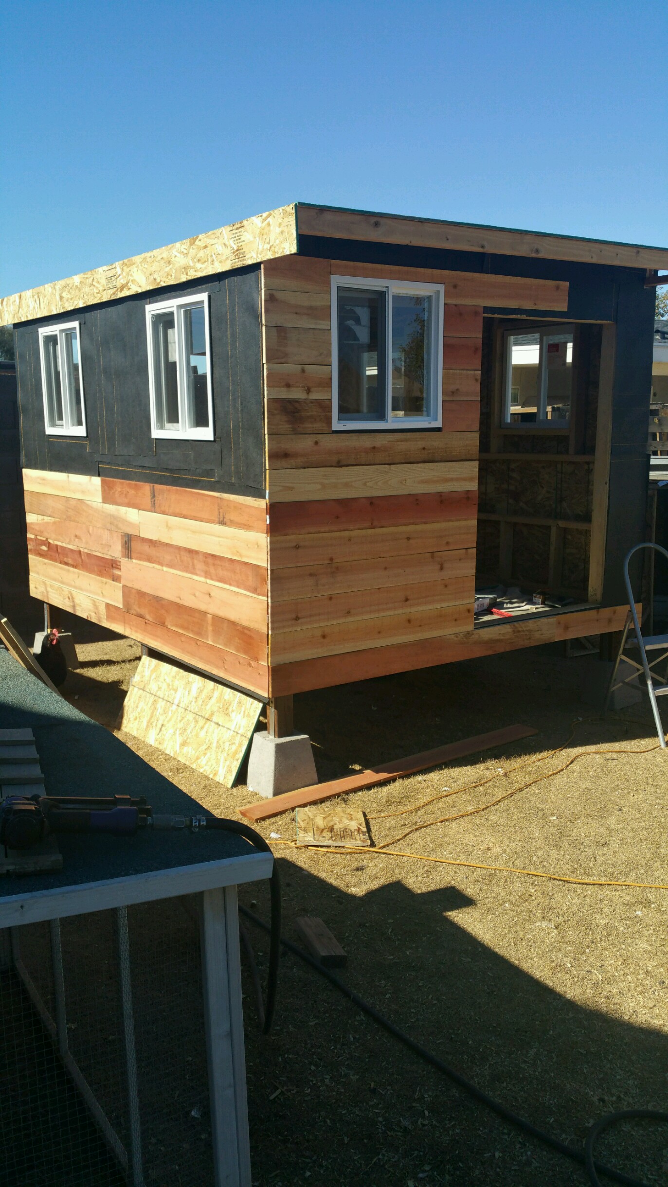 waterproofing then redwood siding