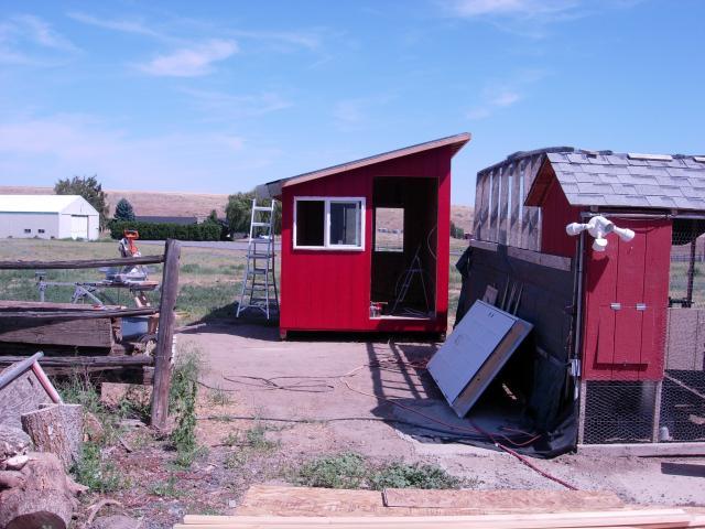 We built the coop on skids and started it out in the field.  Once it was done, we pulled it into place with the tractor and attached it to the existing run that we had.